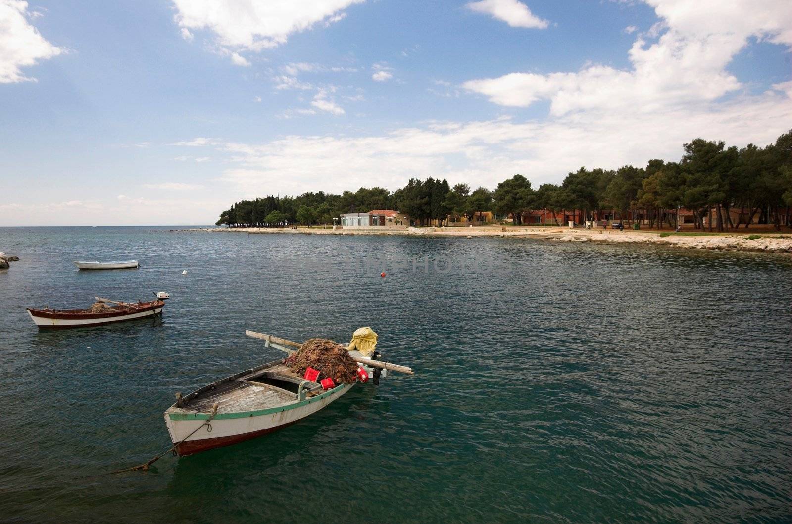 Fishing boats moored in a sea harbor