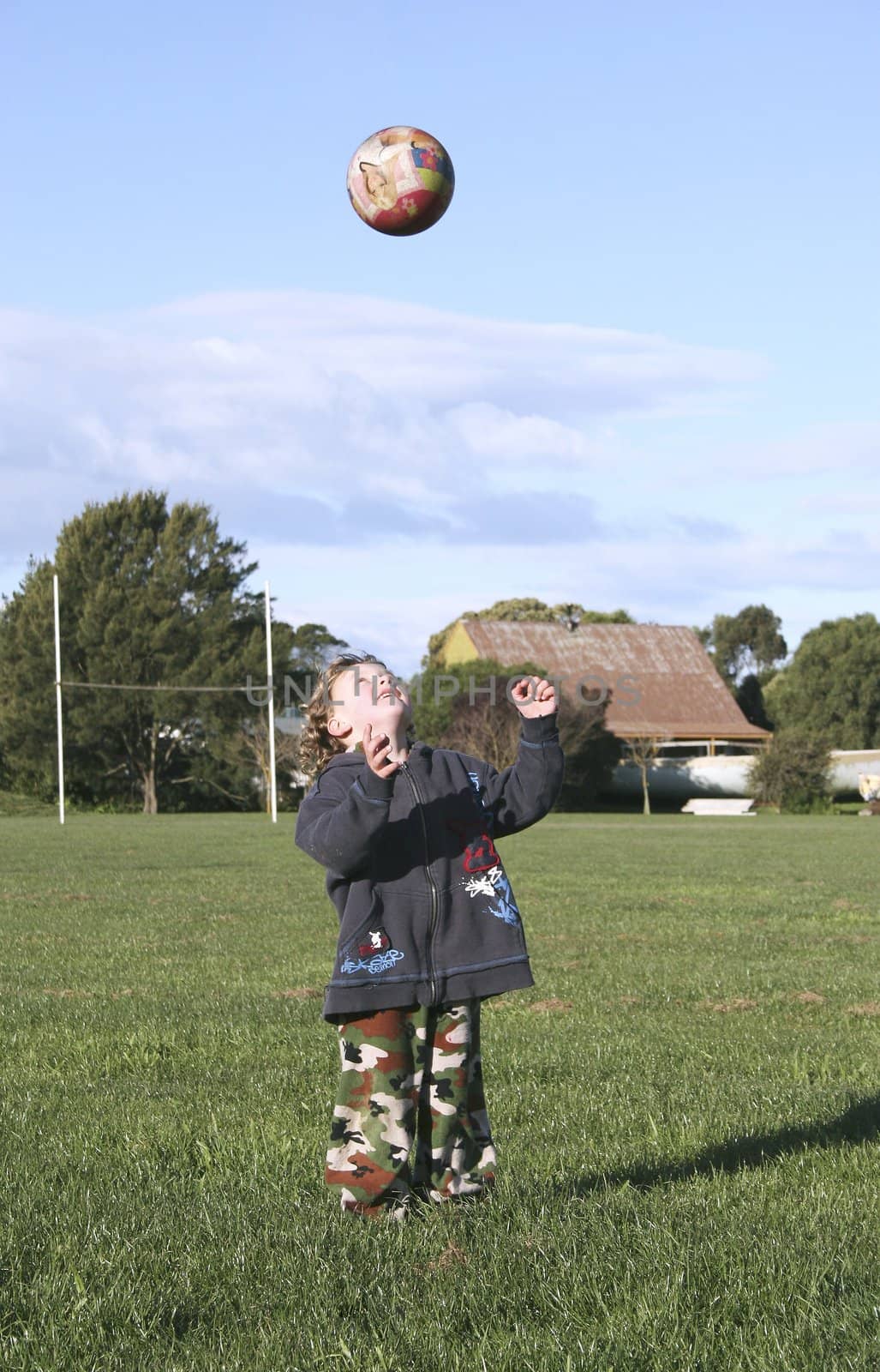 Kicking a ball around at the local park