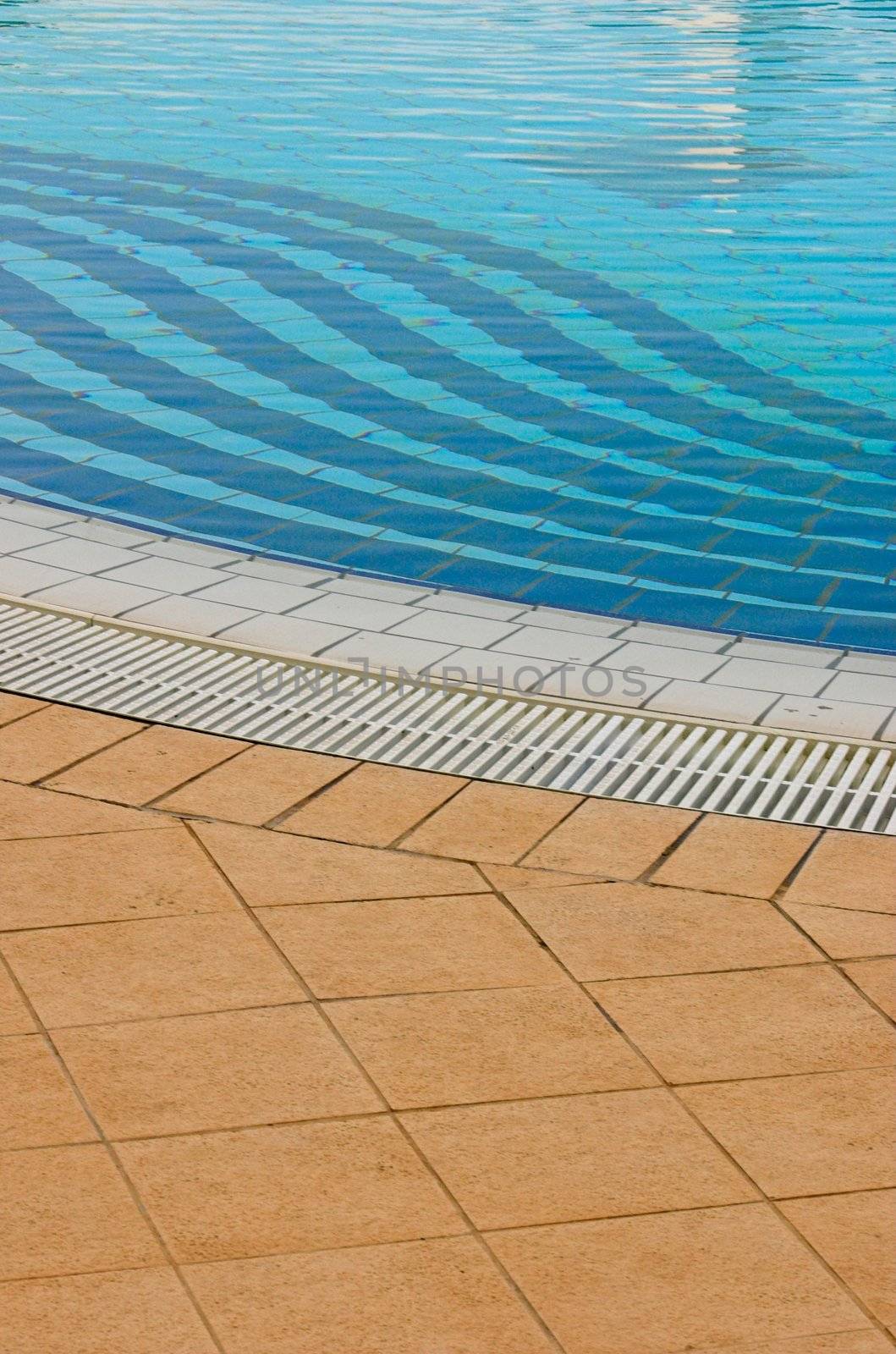 Detail of a white tiled swimming pool