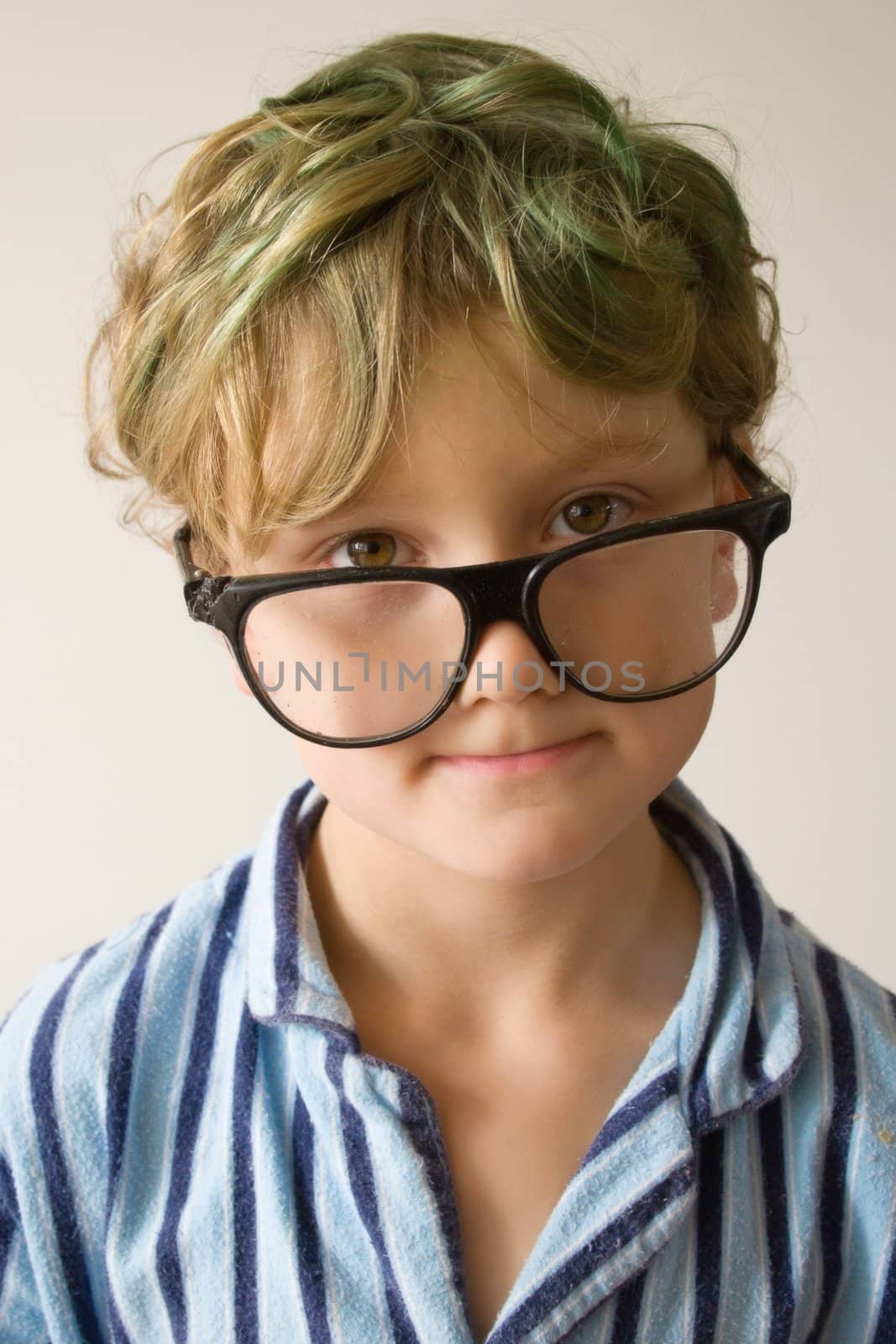 Young male boy hanging around in his pyjamas for the day.