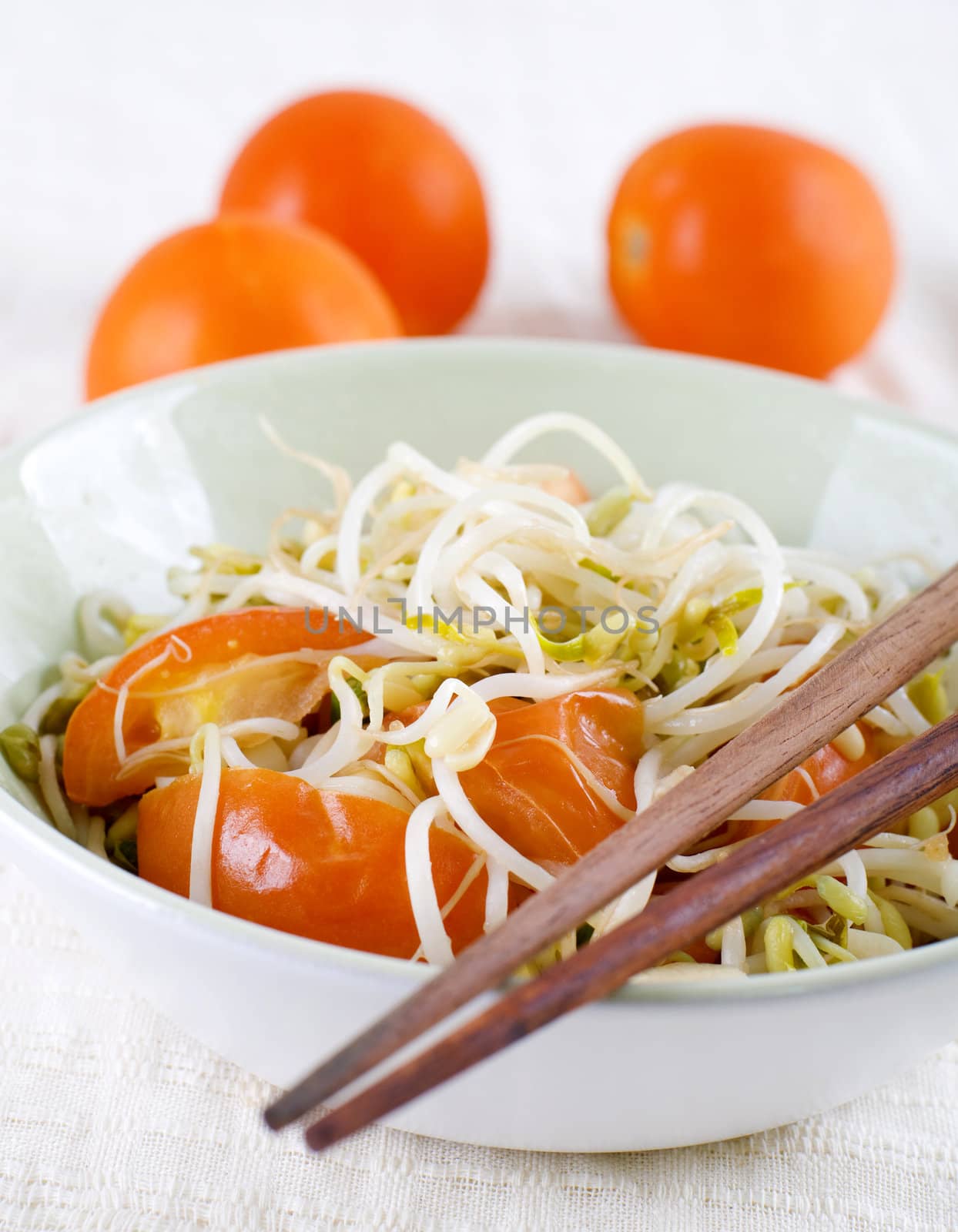 Cooked organic bean sprouts with tomatoes.