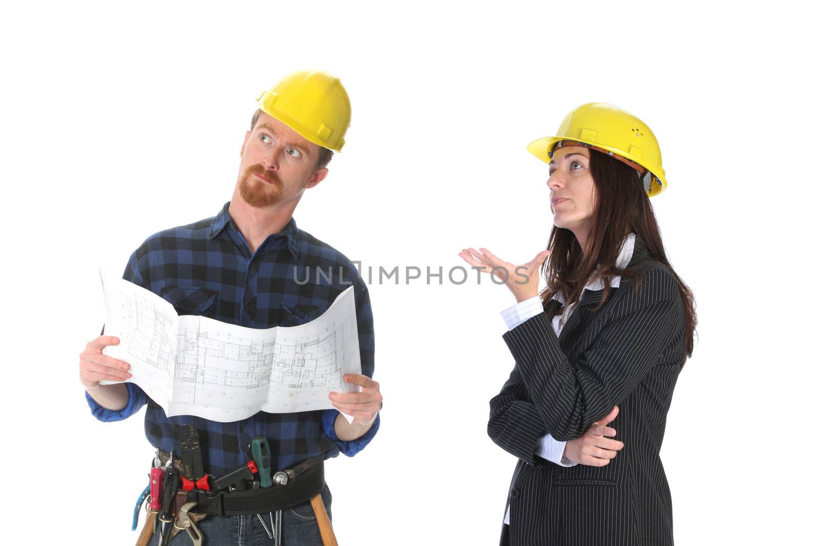 construction worker and businesswoman with architectural plans