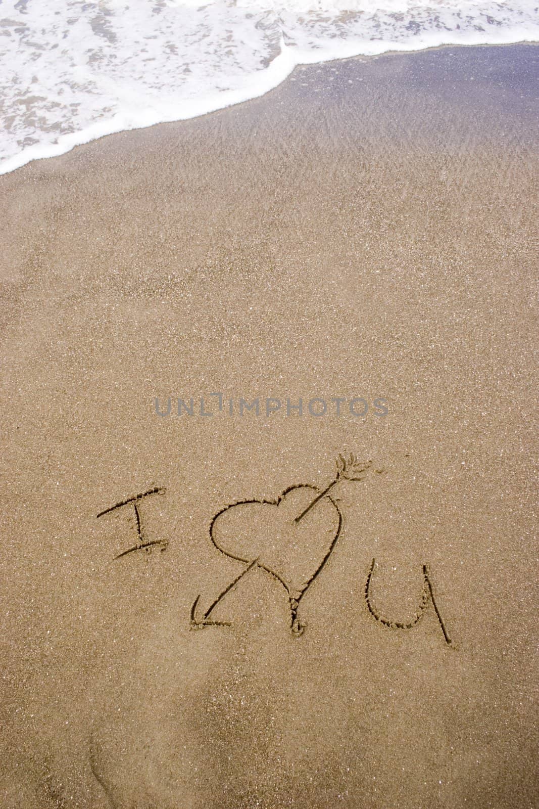 I love you written in the sand.