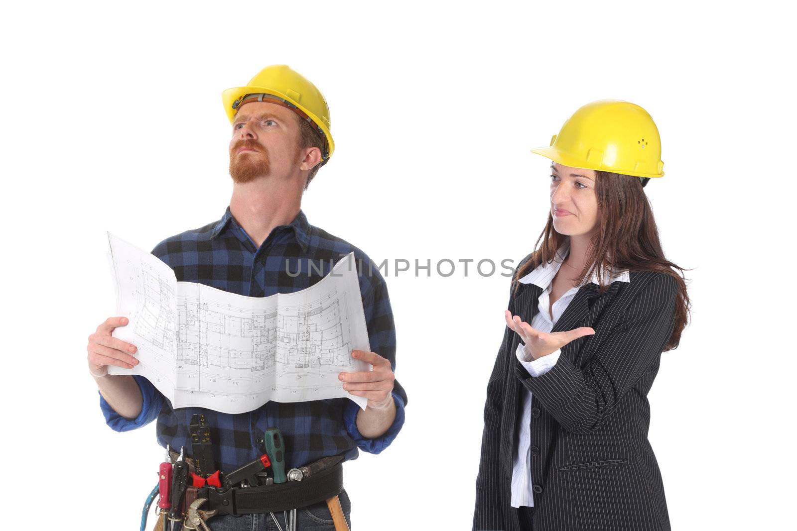 construction worker and businesswoman with architectural plans