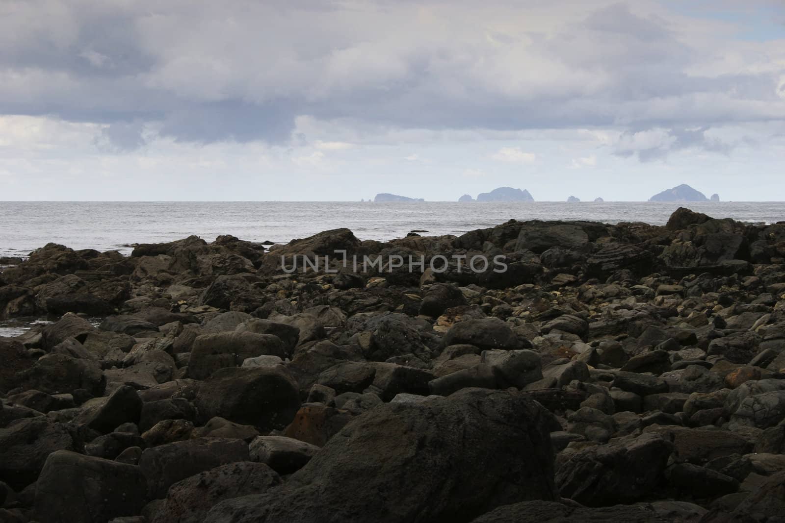 Rocks and islands off Pauanui Beach, Coromandel Peninsula, New Zealand