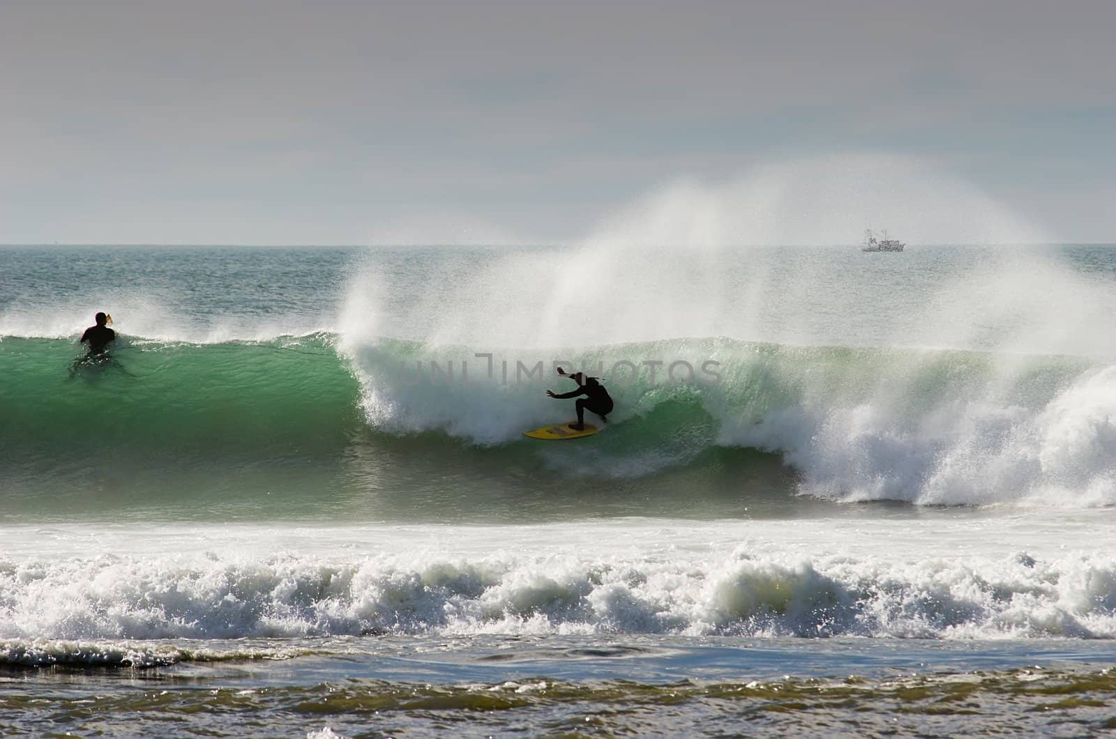 Surfing the break at Haumoana Beach, Hawke's Bay, New Zealand