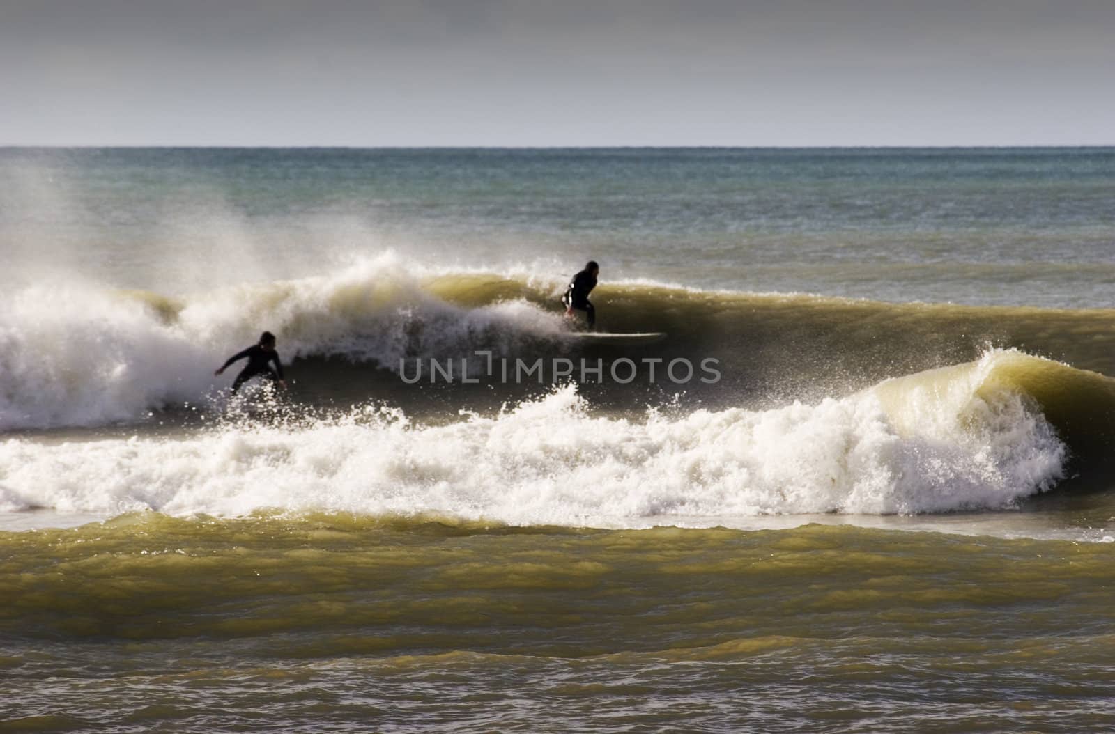 Surfing the break at Haumoana Beach, Hawke's Bay, New Zealand