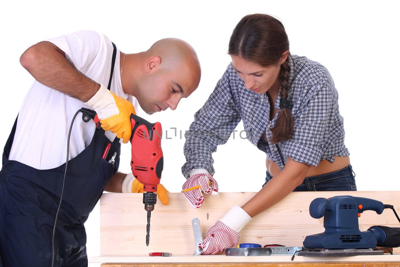 construction workers at work on white background