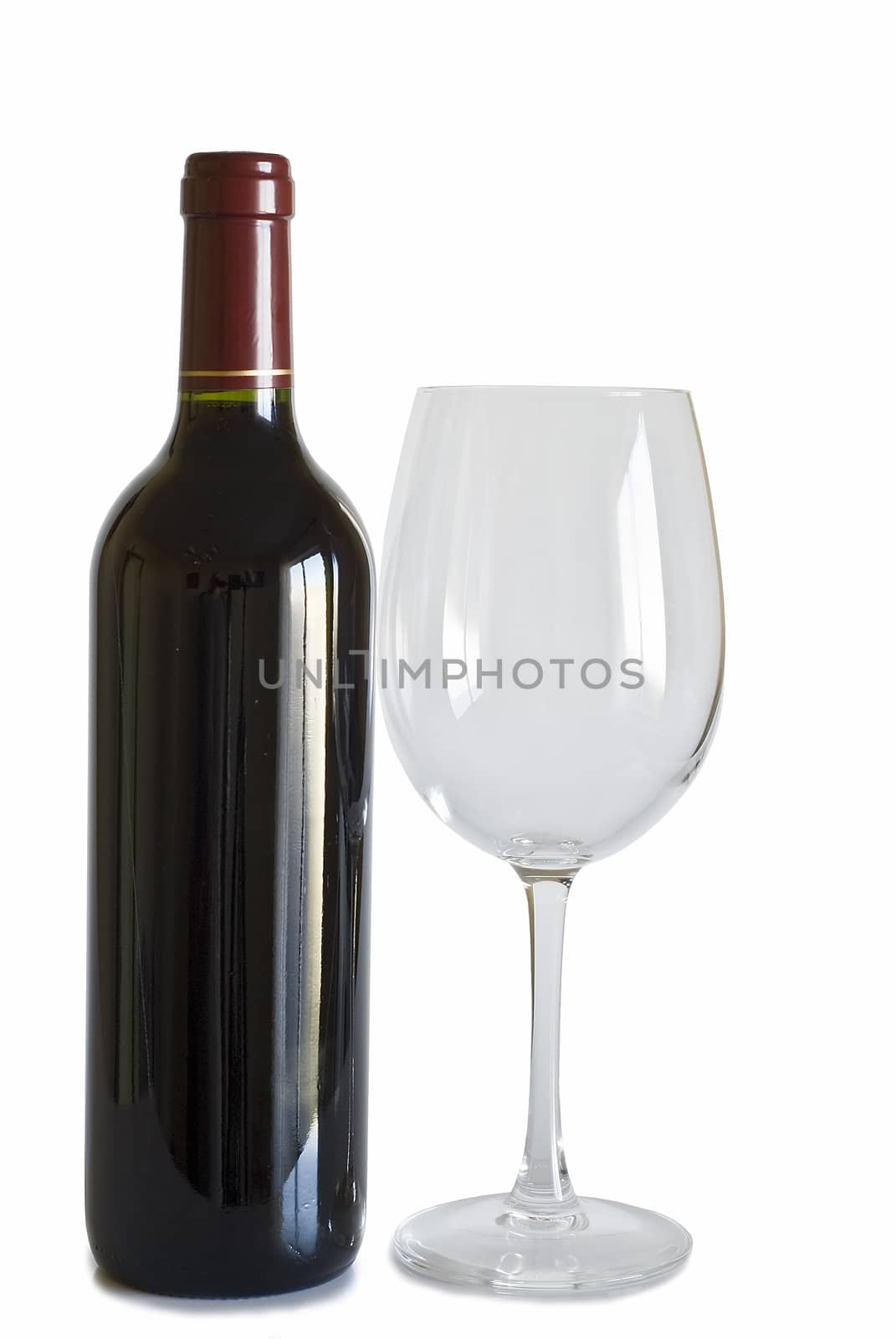 Still life abour red wine with a white background.