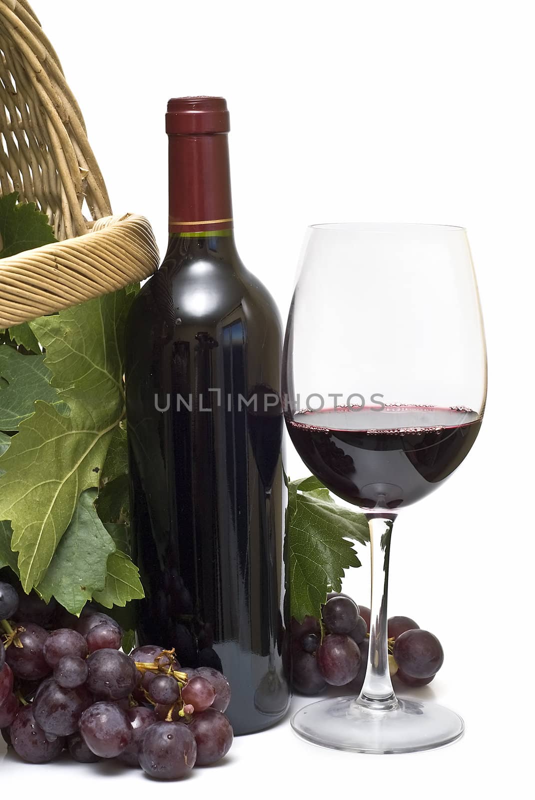 Still life abour red wine with a white background.