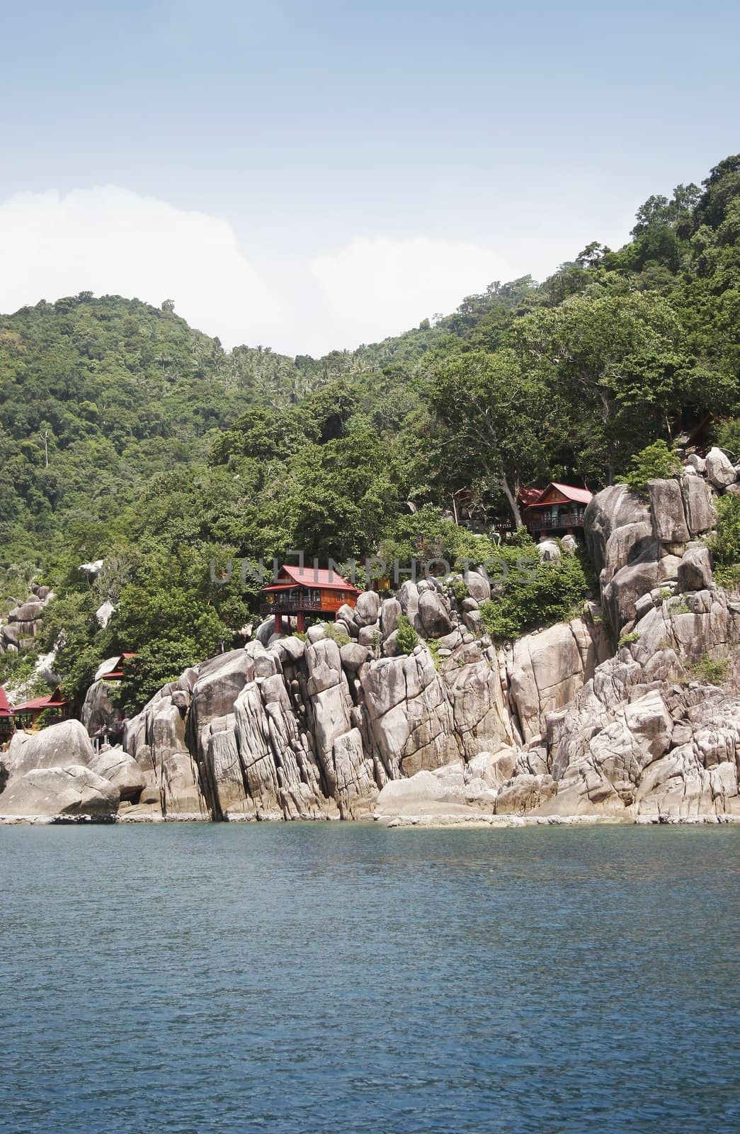 Rock formations and bungalows on the coast of Koh Tao Island, Thailand