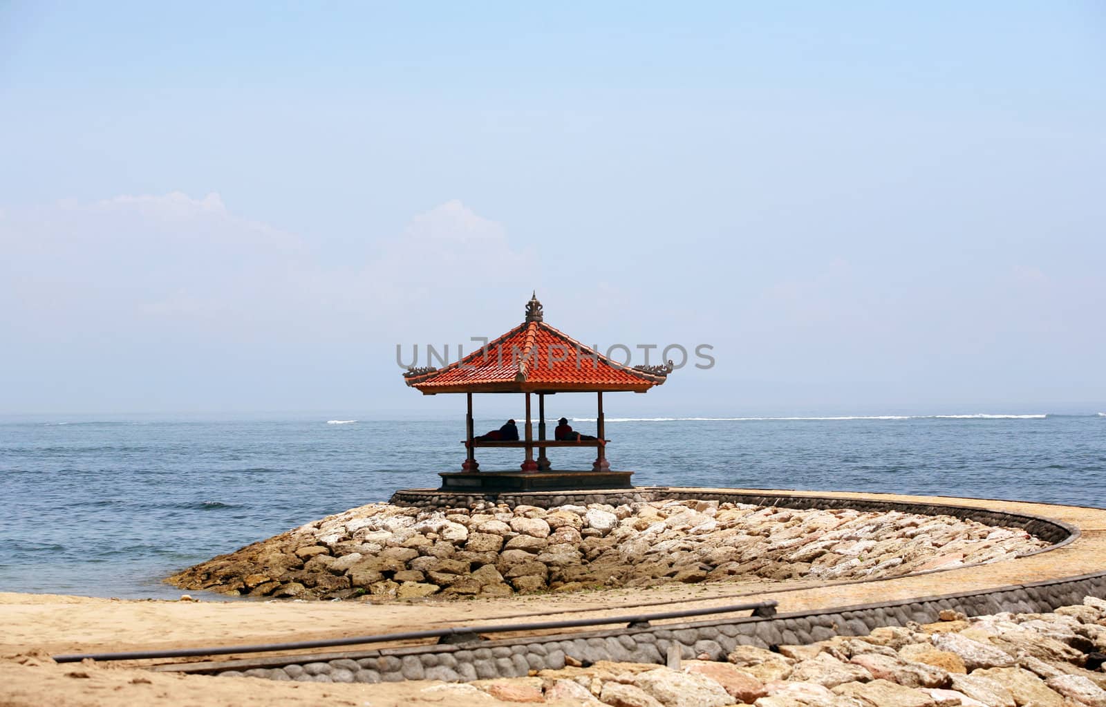 The two men relaxing at seaside. Bali. Indonesia