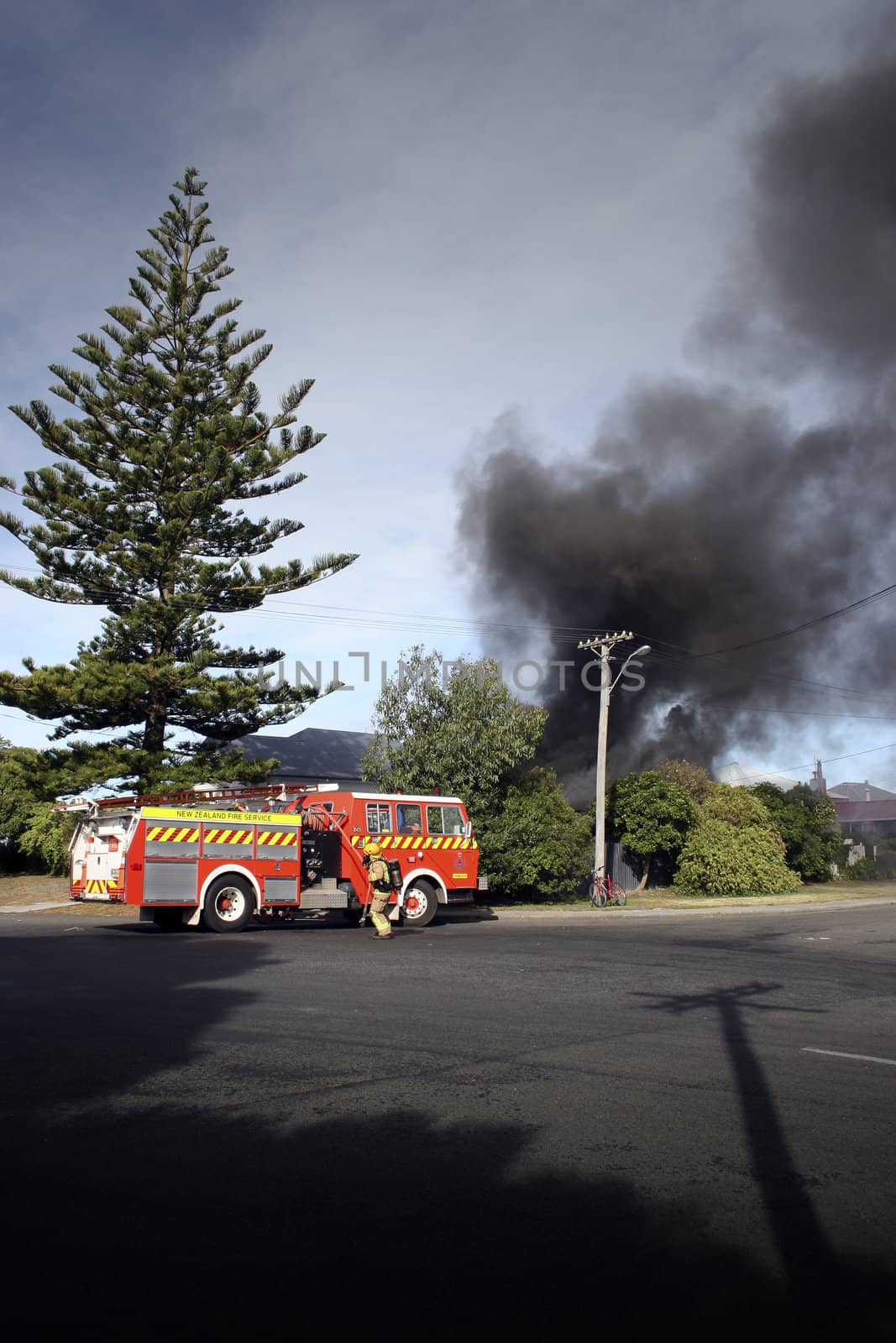 Firemen attending a house fire in Haumoana, New Zealand