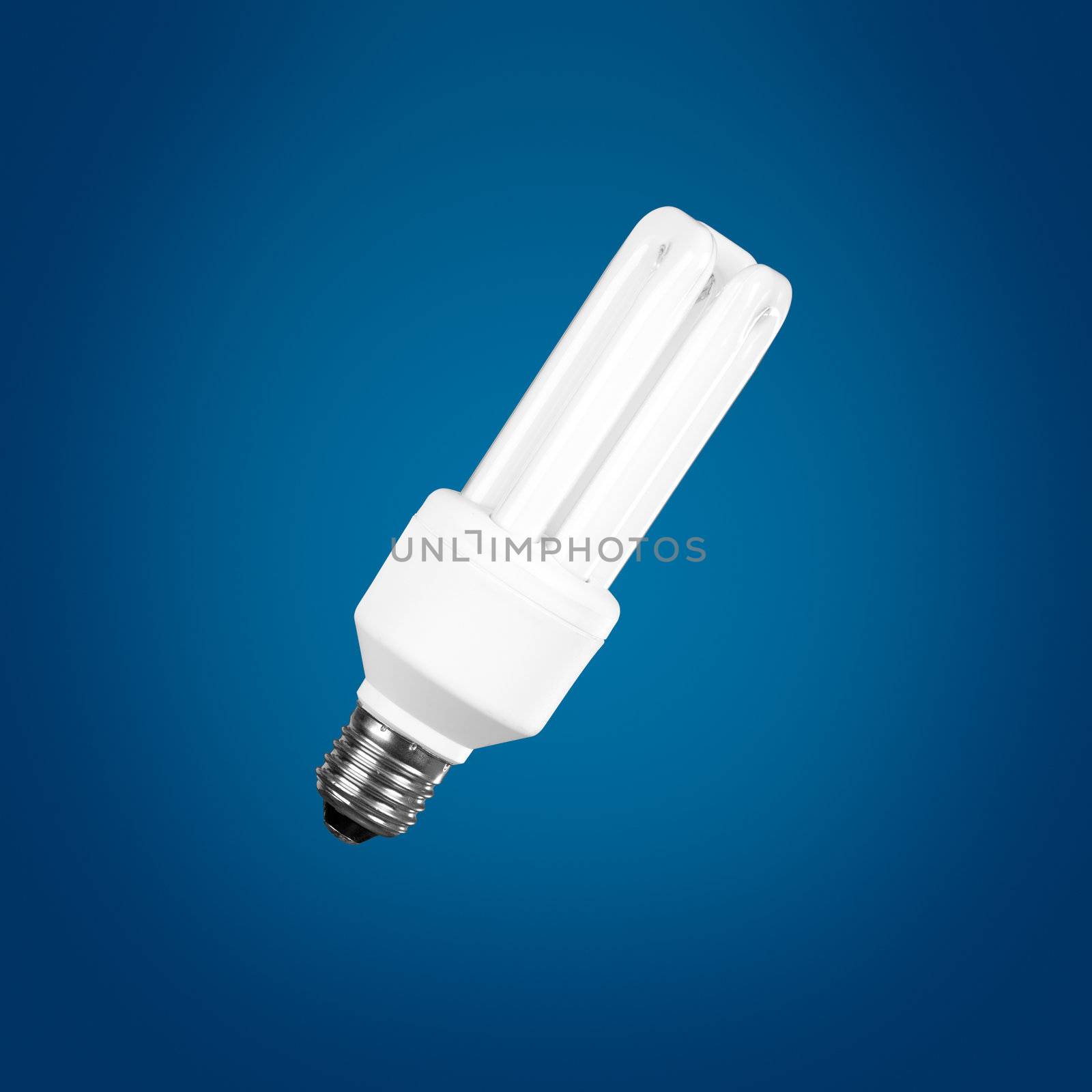 Fluorescent Light Bulb on a blue background, energy concept