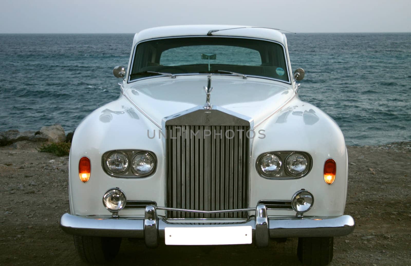 Front profile of a white luxury car