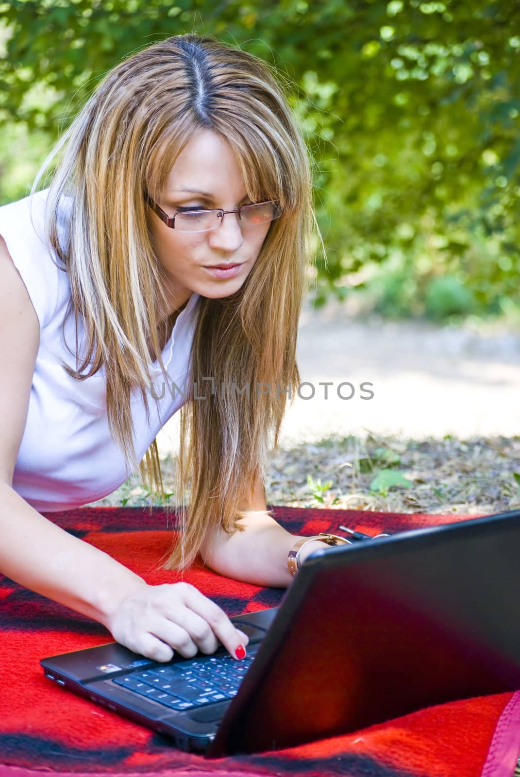 beautiful young woman working out with laptop or notebook