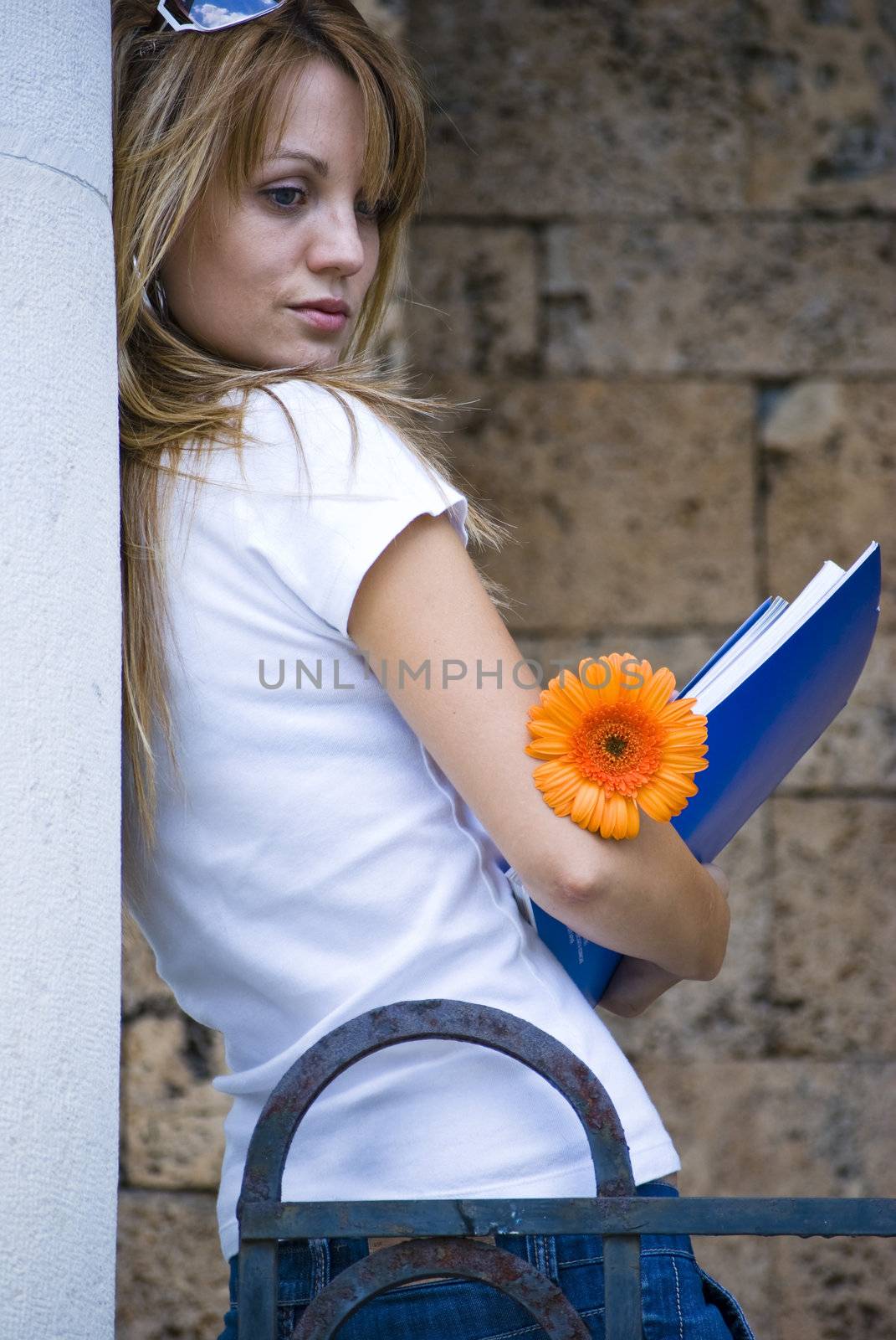 beautiful young woman with books and flower by Dessie_bg