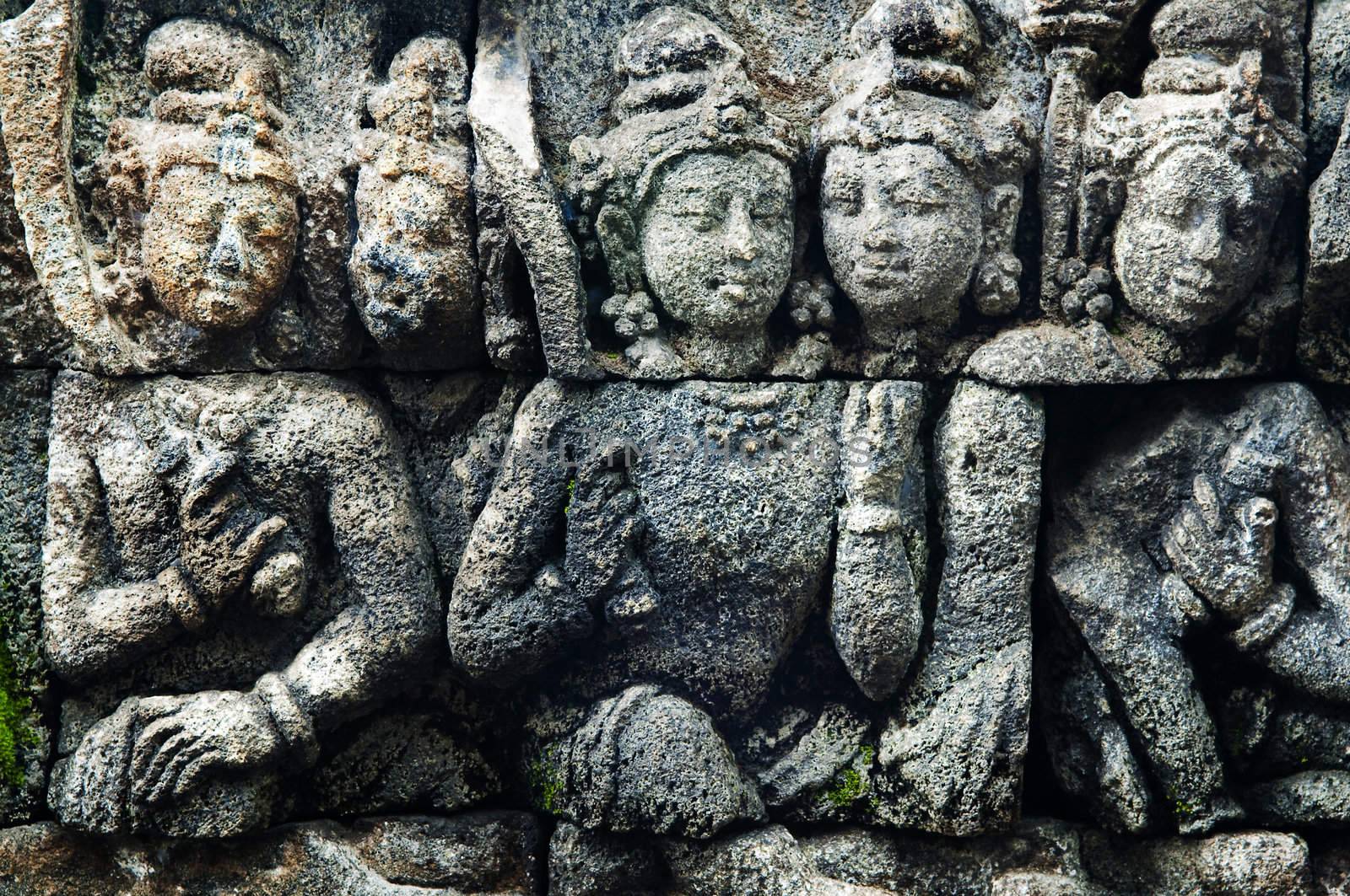 Detail of carved relief at Borobudur on Java, Indonesia.