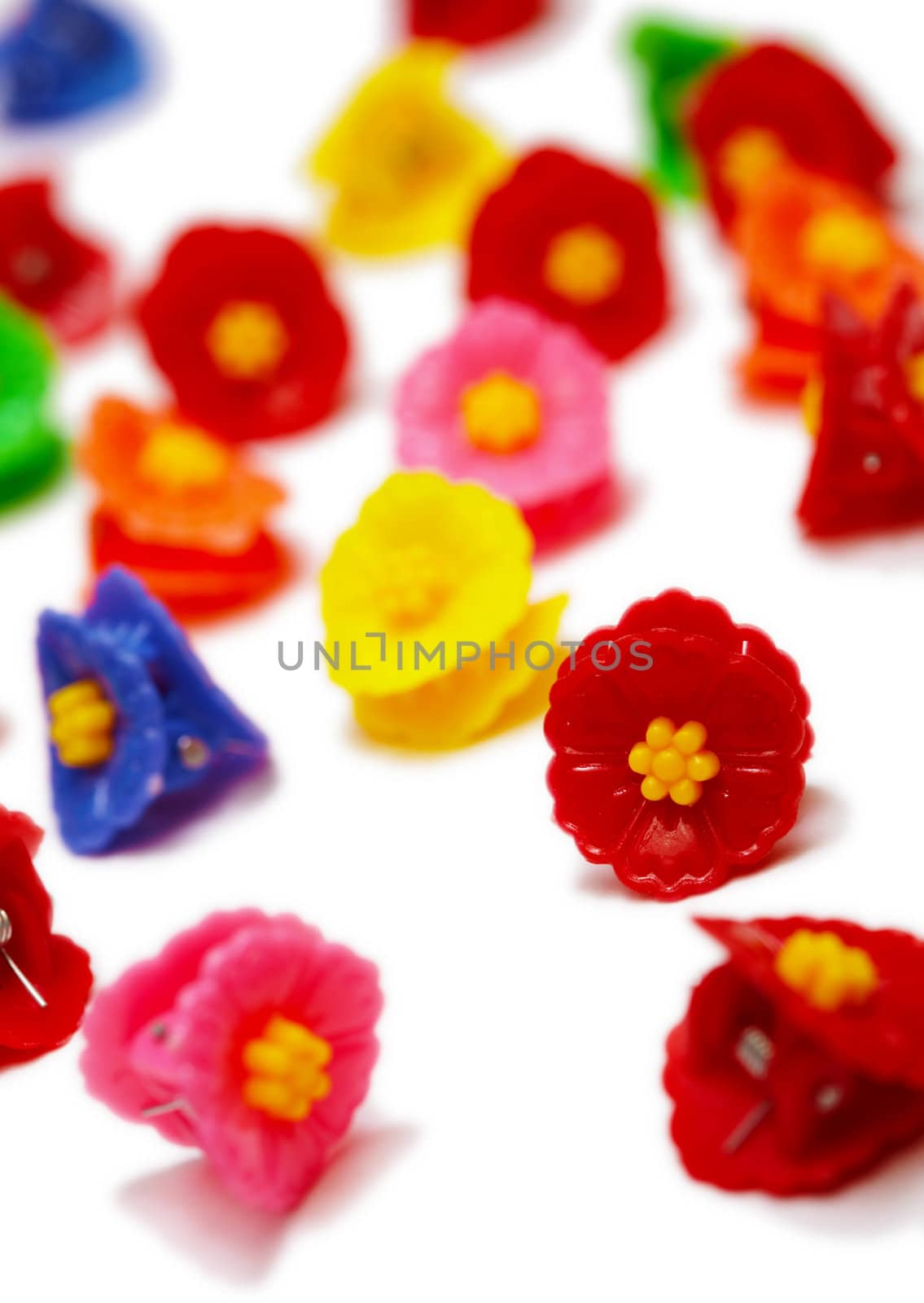 Several plastic color hairpins isolated on white background