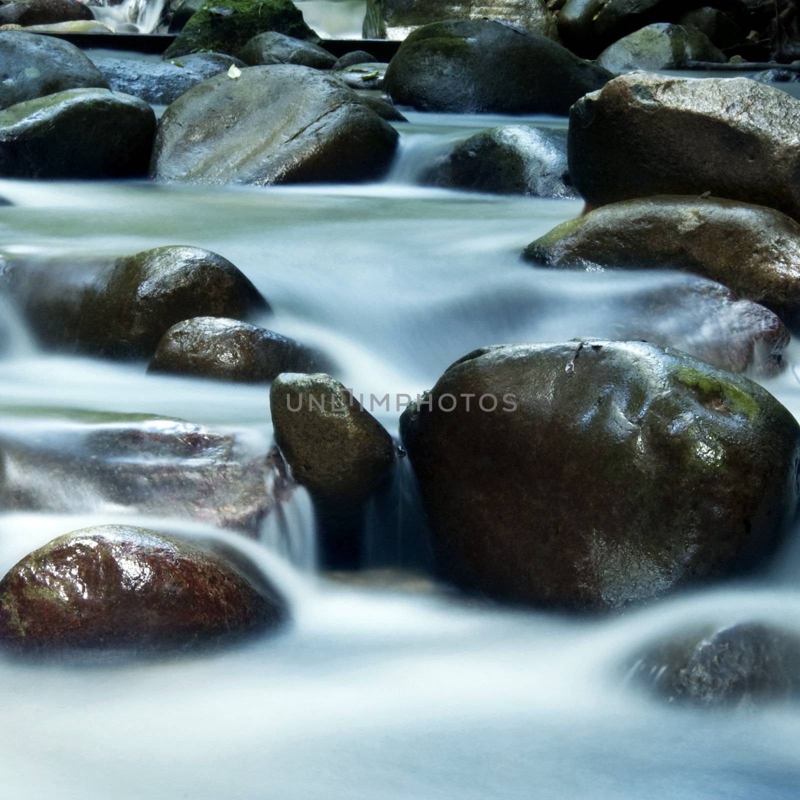 Zen water flowing in 25 seconds long exposure. 