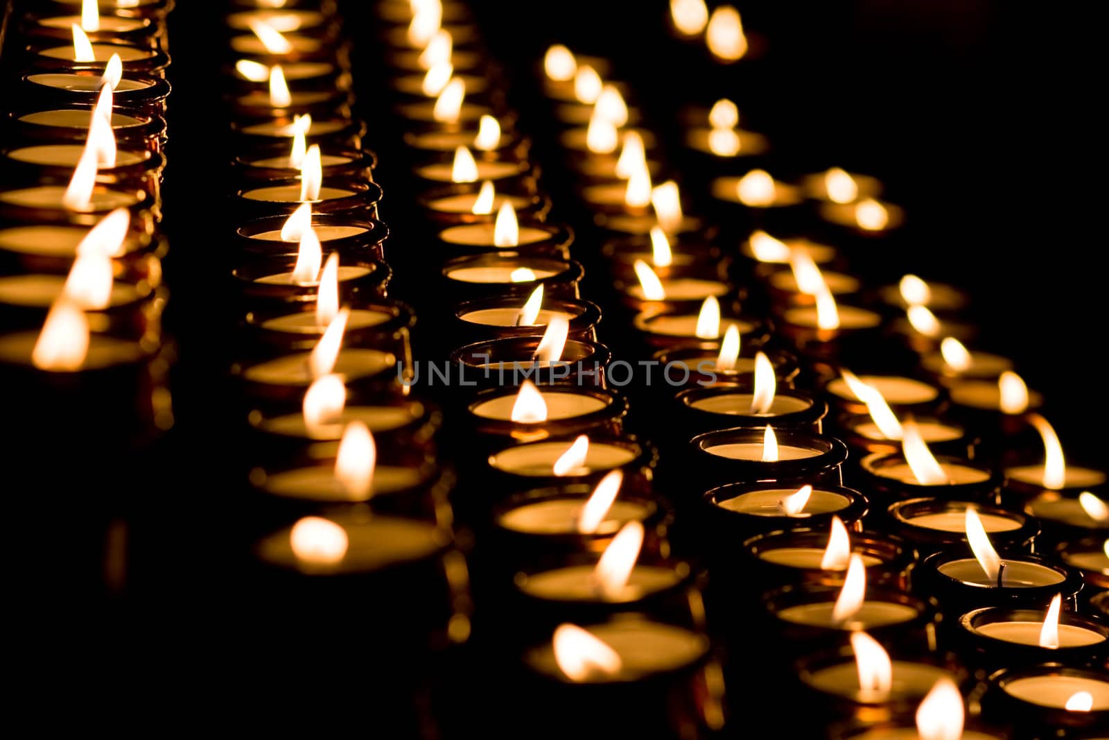 candle light in a church by anobis