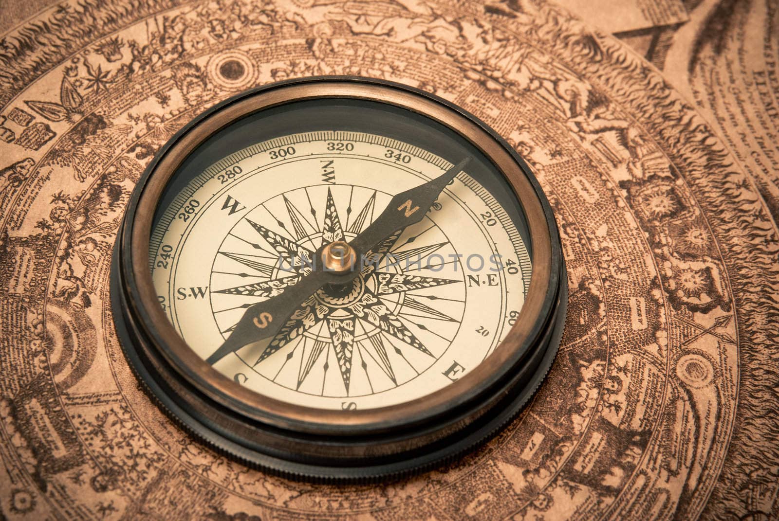 Antique Compass on Map by bloomua