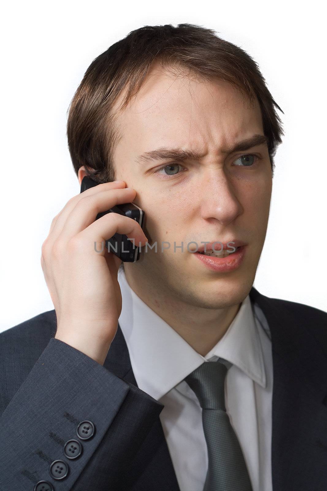 Young professional, worried on the phone, isolated over white