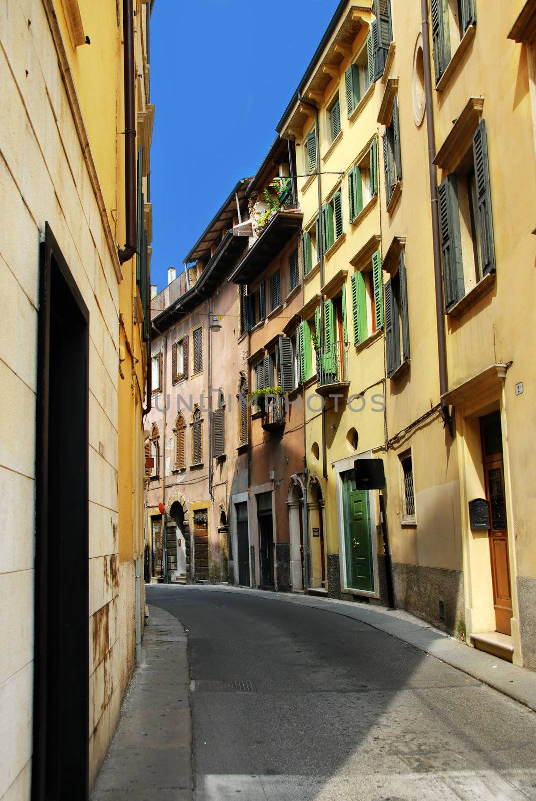 urban view of Verona, Italy, narrow curve street