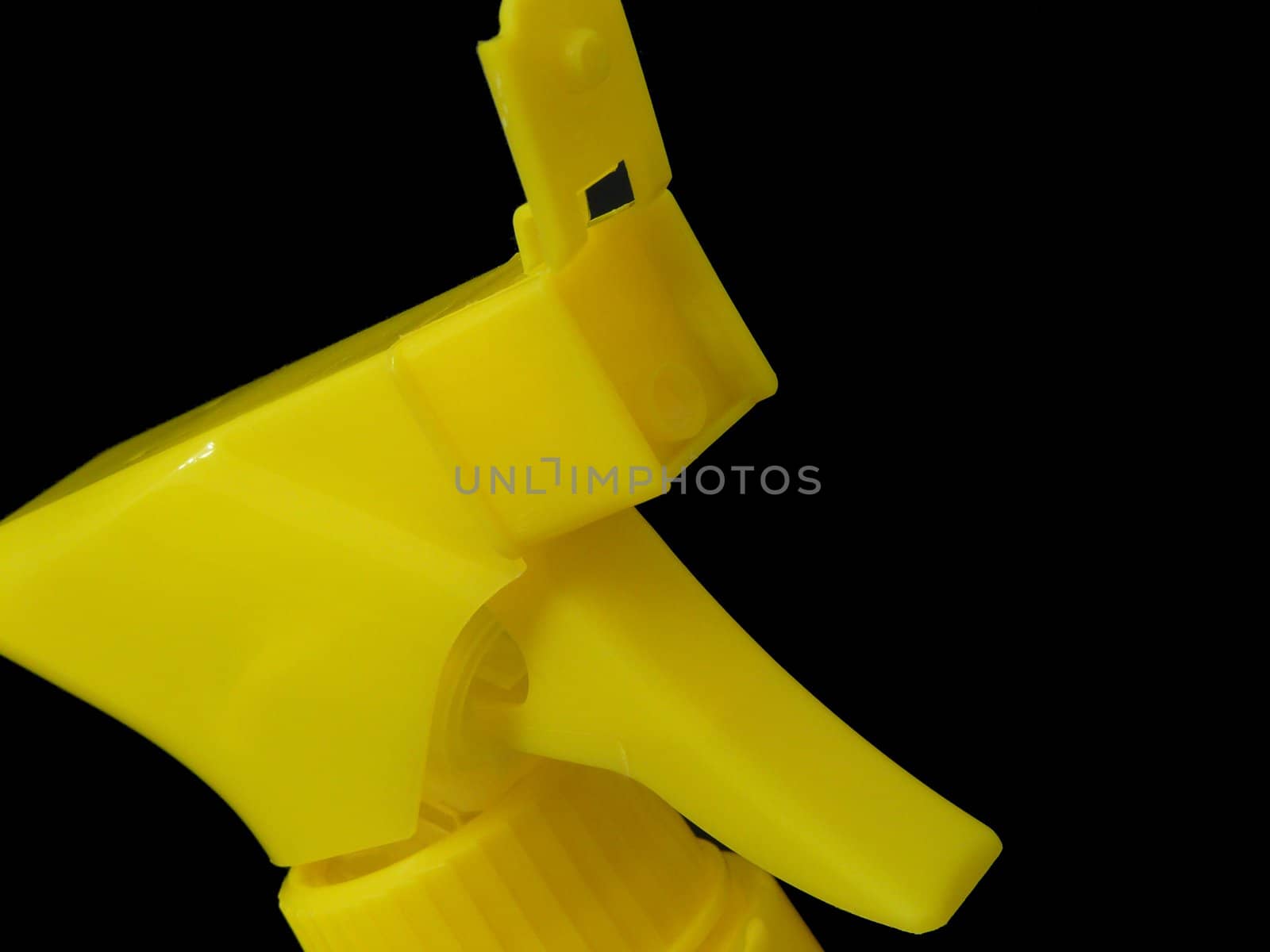 Yellow sprayer on black background by EugenP