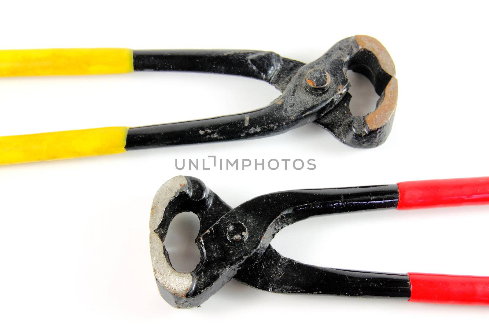 a pair of pliers on white background