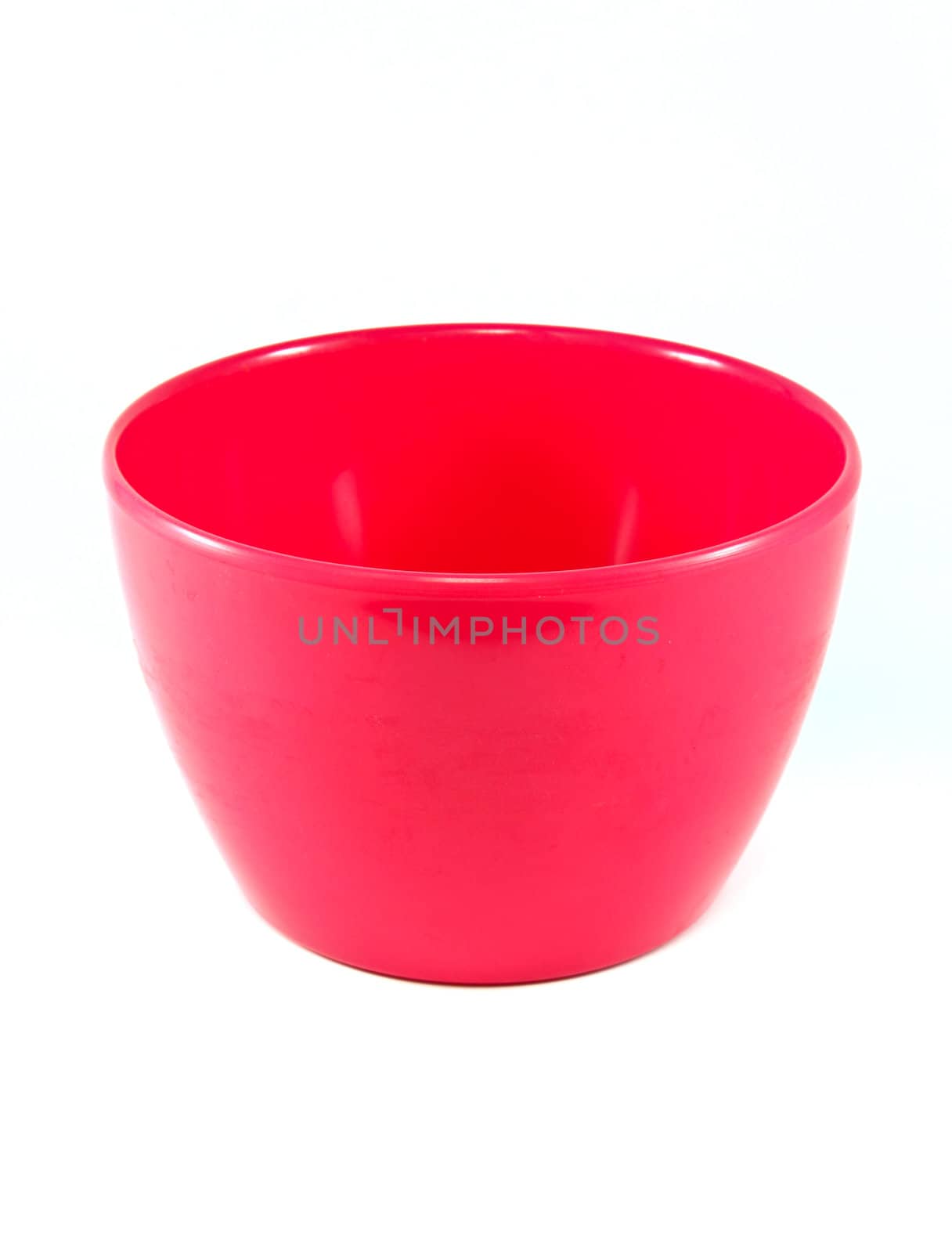Pink empty plastic bowl isolated on white