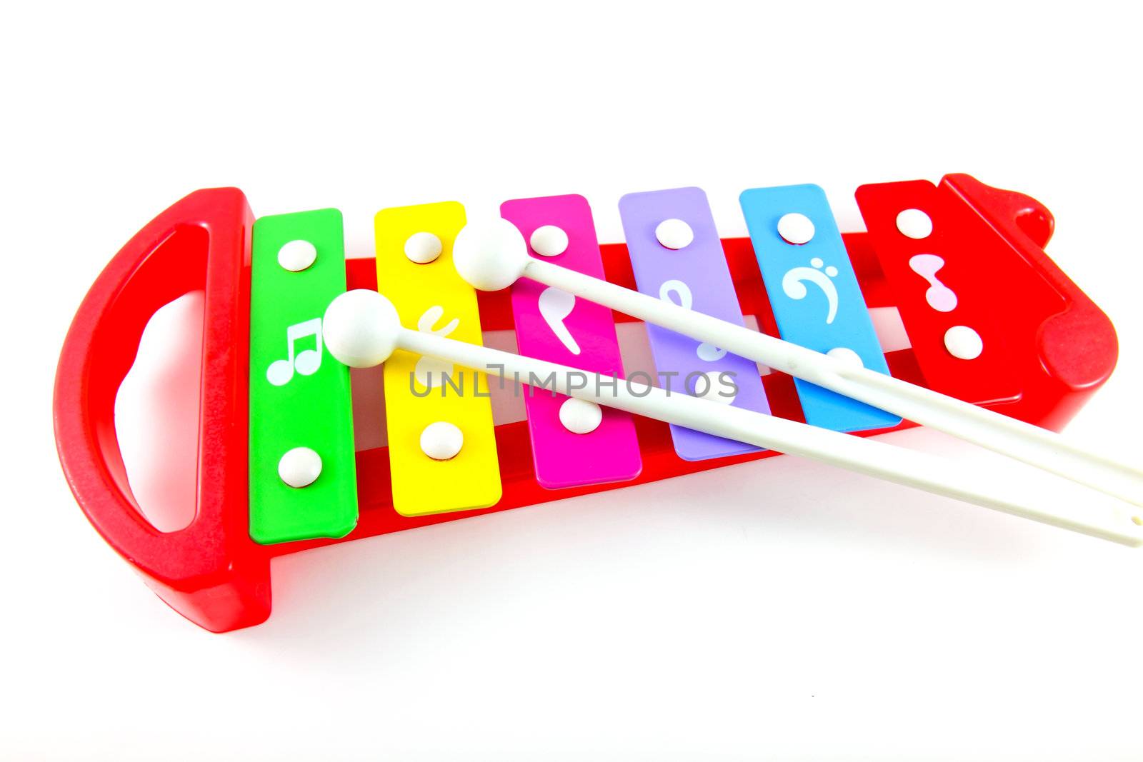 Toy colorful xylophone on white background