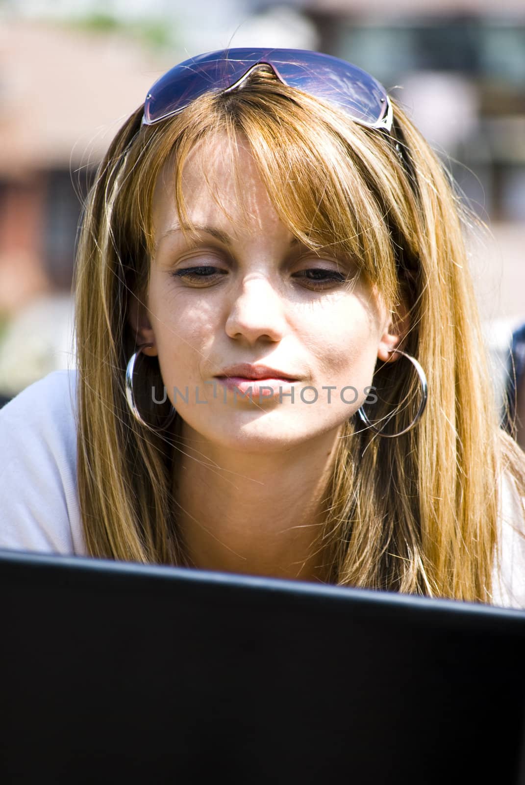 beautiful young woman working out with laptop or notebook