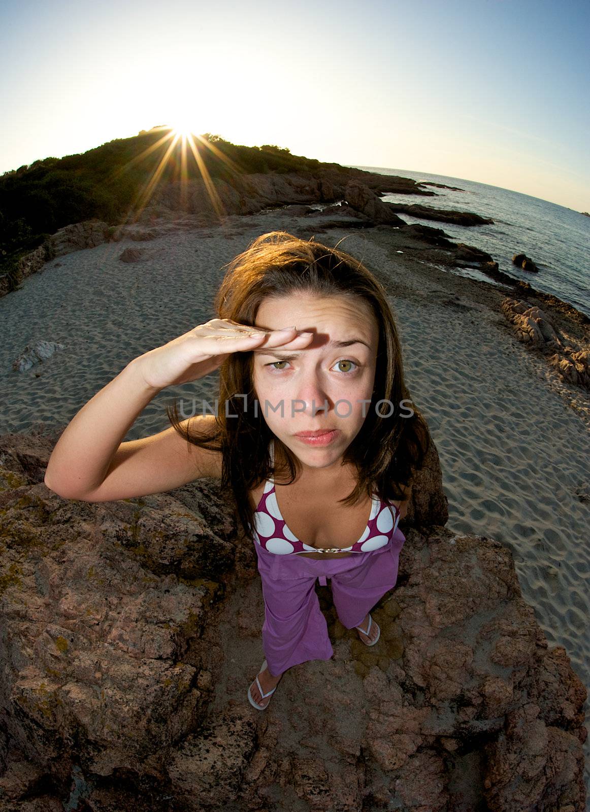 Crazy pretty woman enjoying the beach at sunset time