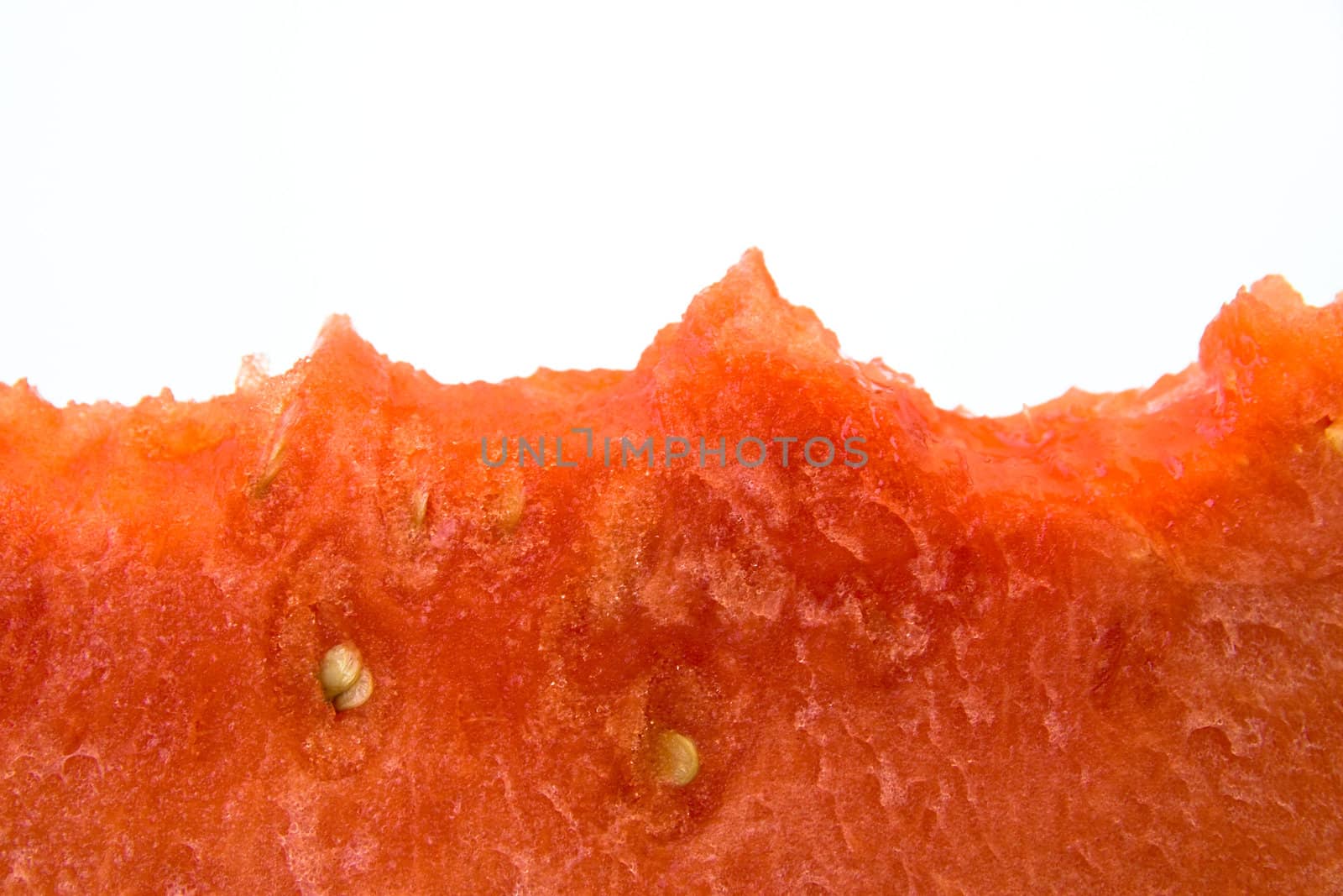 fresh red watermelon isolated over white with bite of human teeth