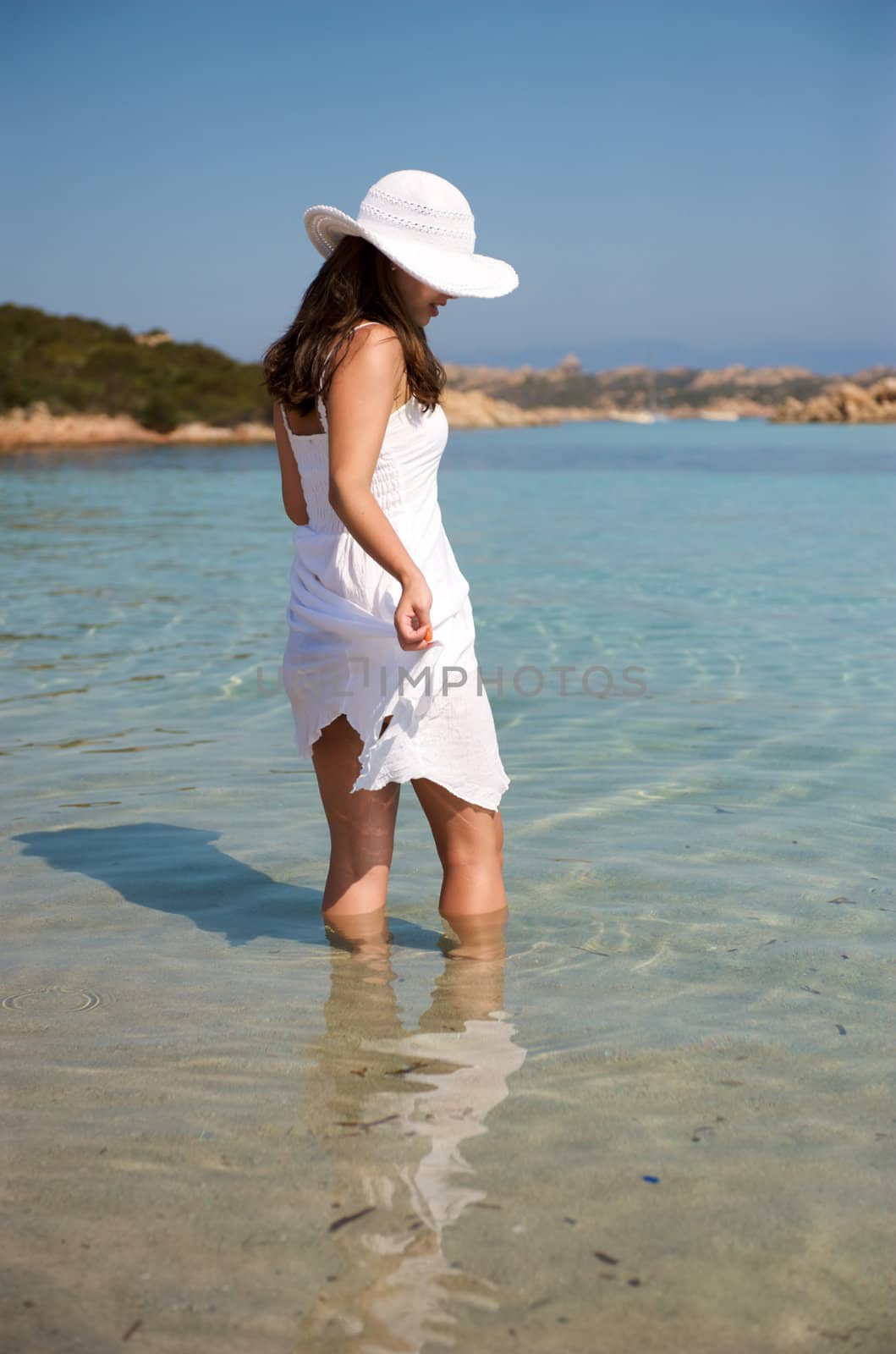 Pretty woman enjoying her vacation in Sardinia