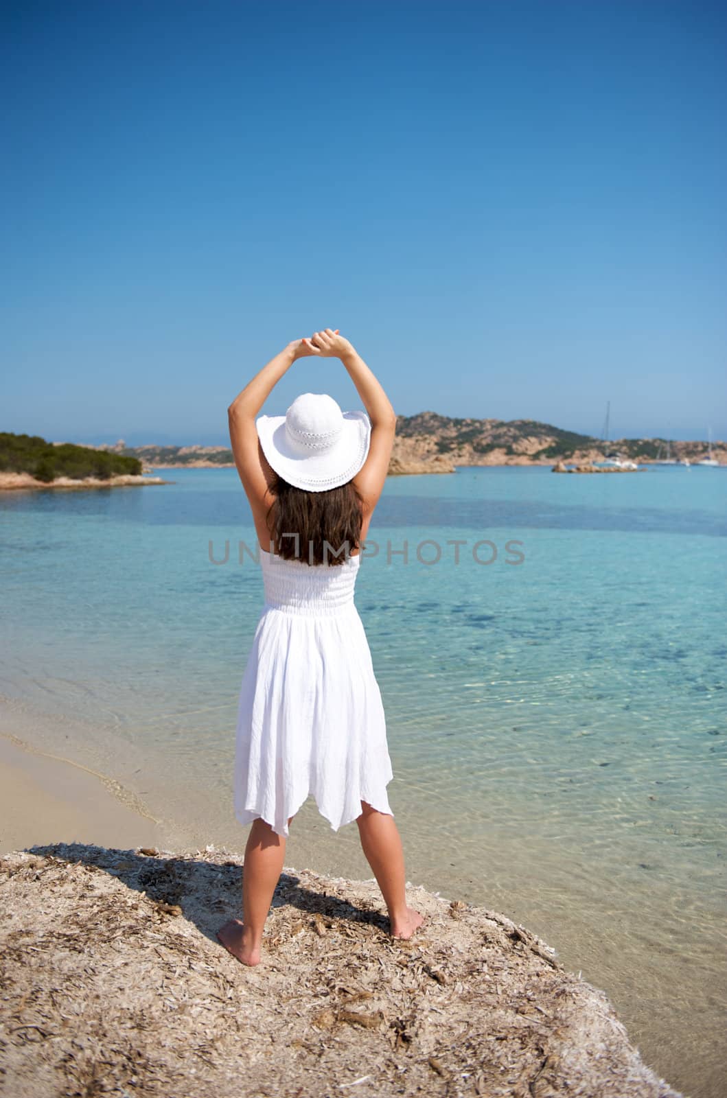 Pretty woman enjoying her vacation in Sardinia