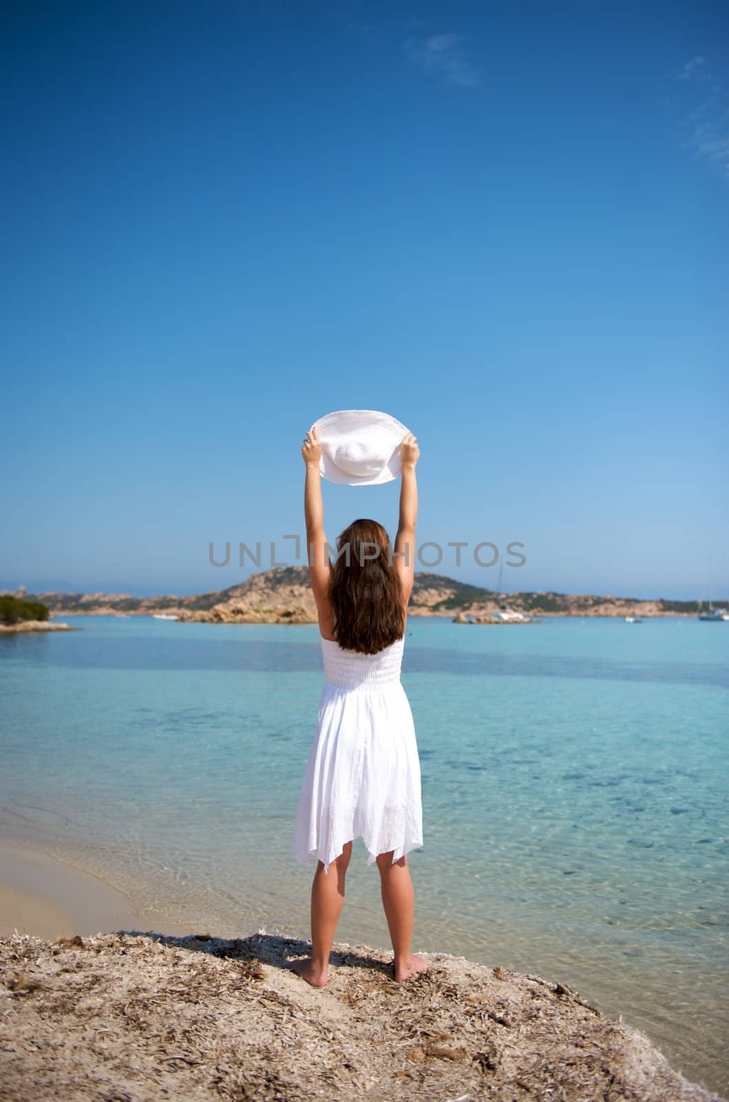 Pretty woman enjoying her vacation in Sardinia