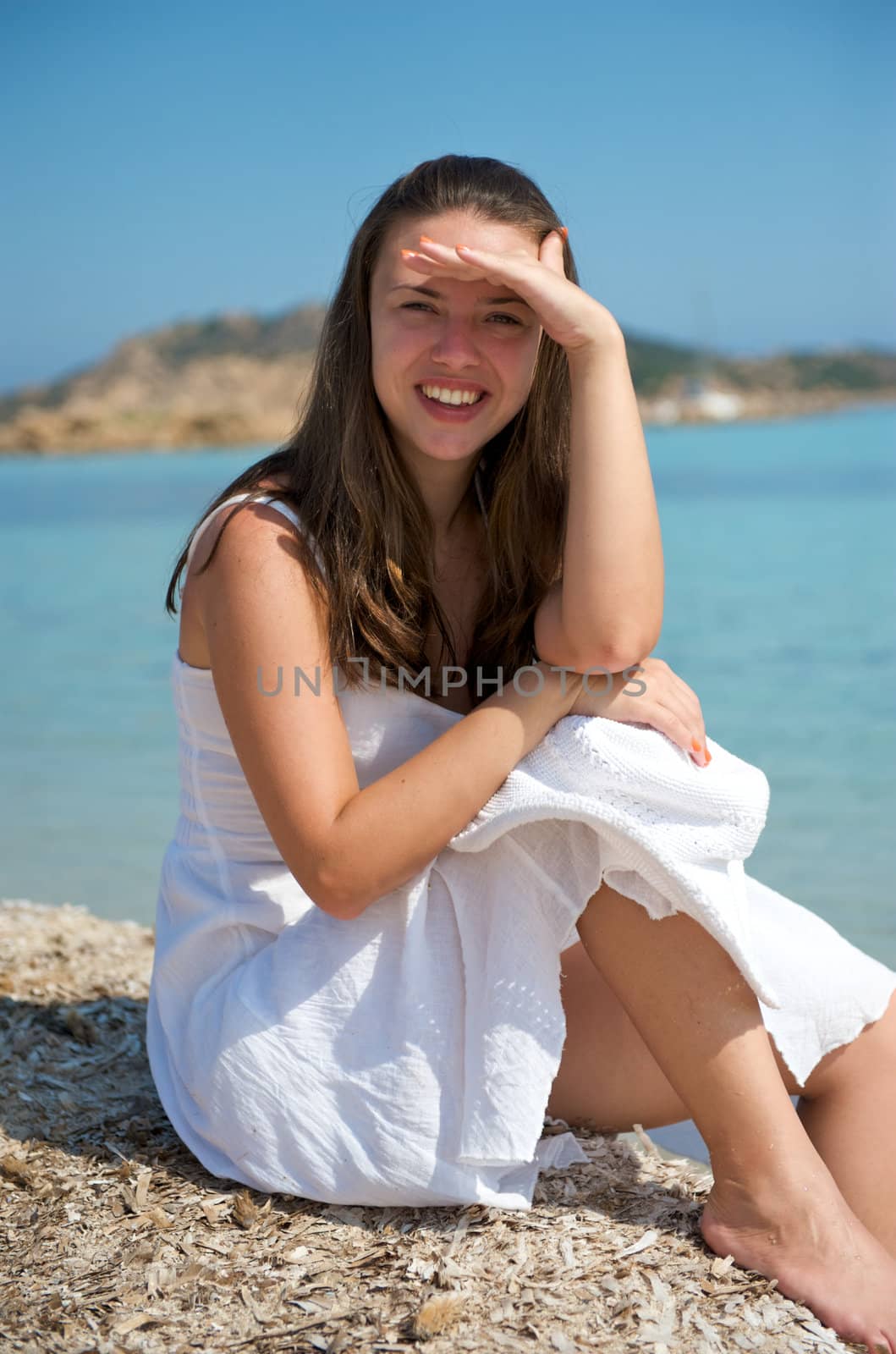 Pretty woman enjoying her vacation in Sardinia