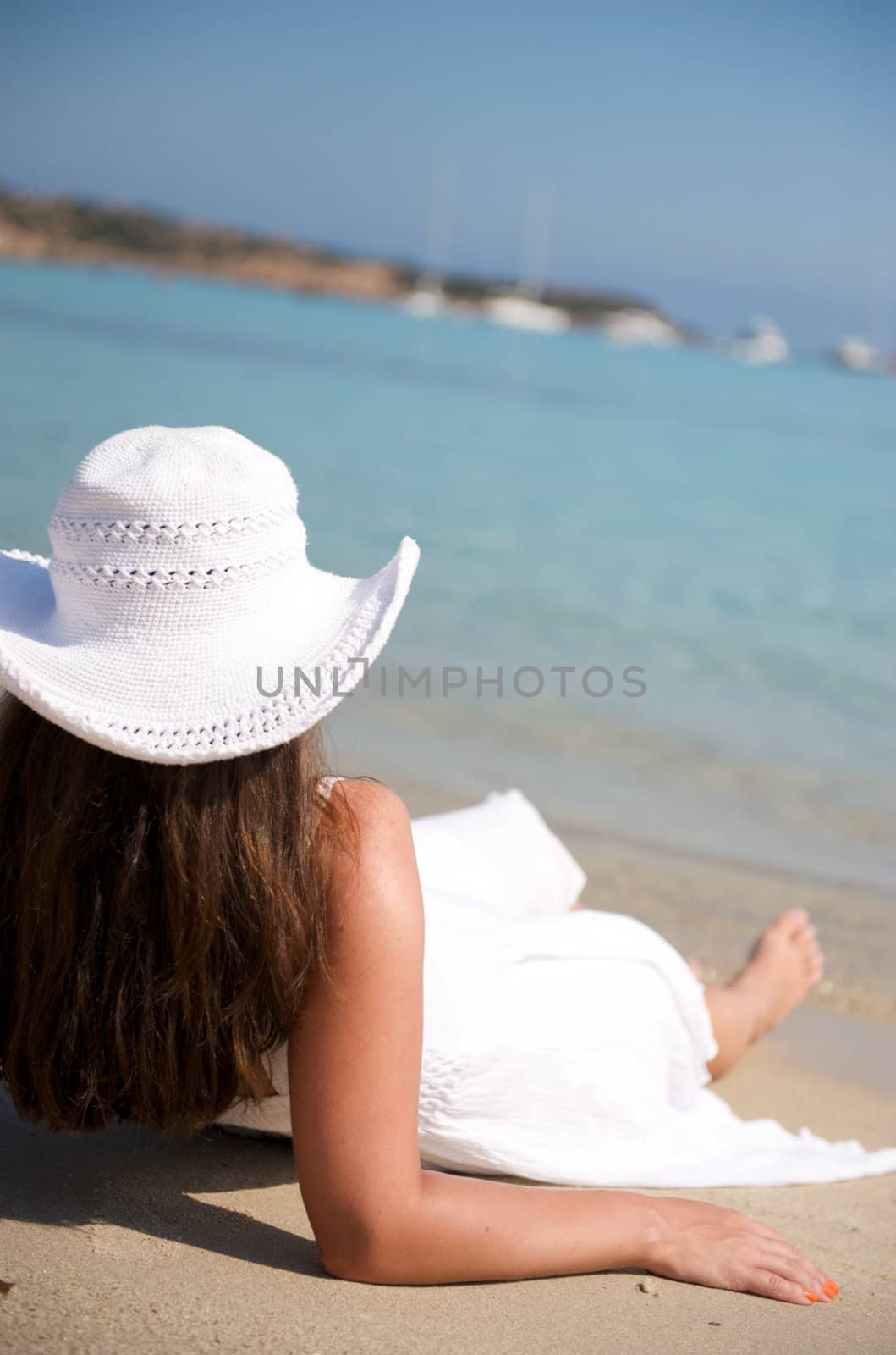 Pretty woman enjoying her vacation in Sardinia