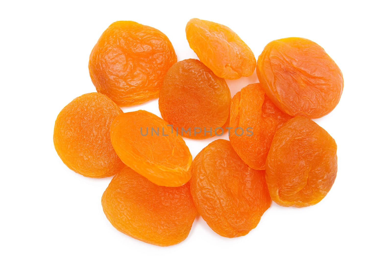 Dried apricots on the white background