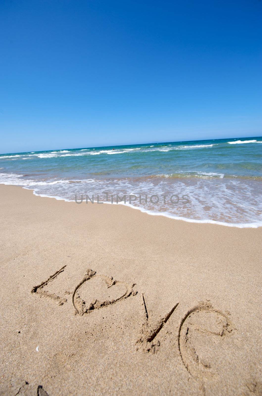 Message writing on a wonderful beach