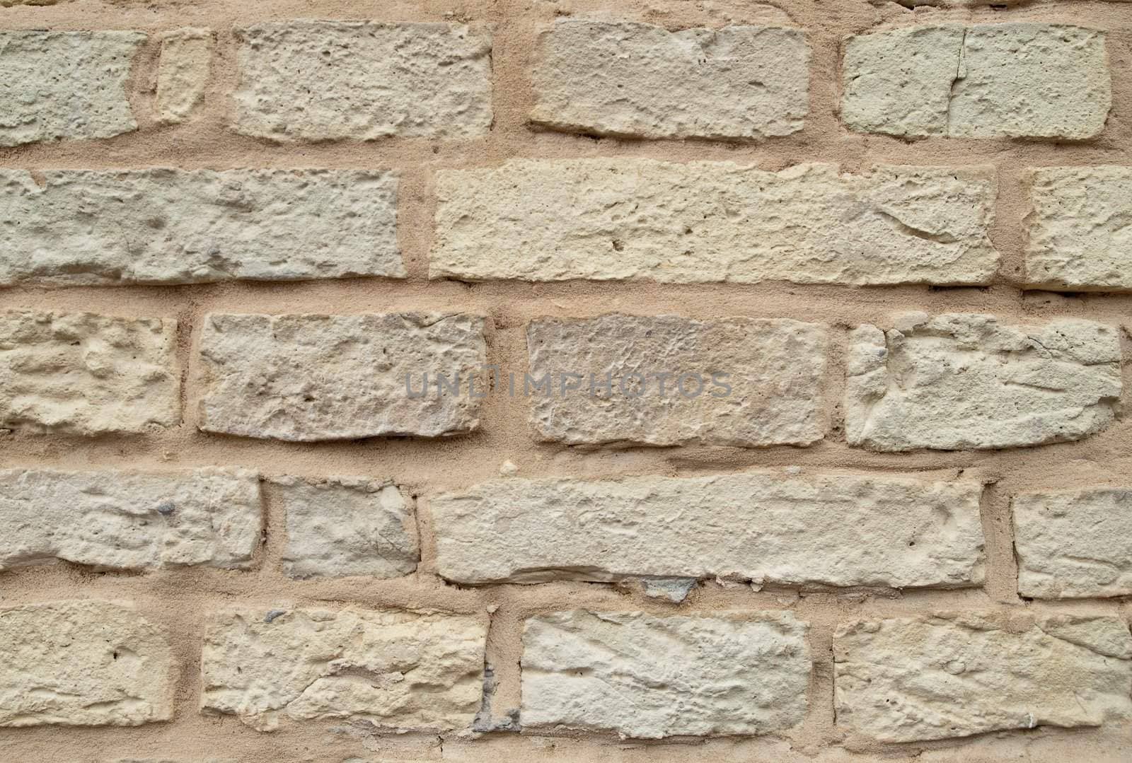 Old Stone Brick Wall Texture tile.Yellow brick wall.