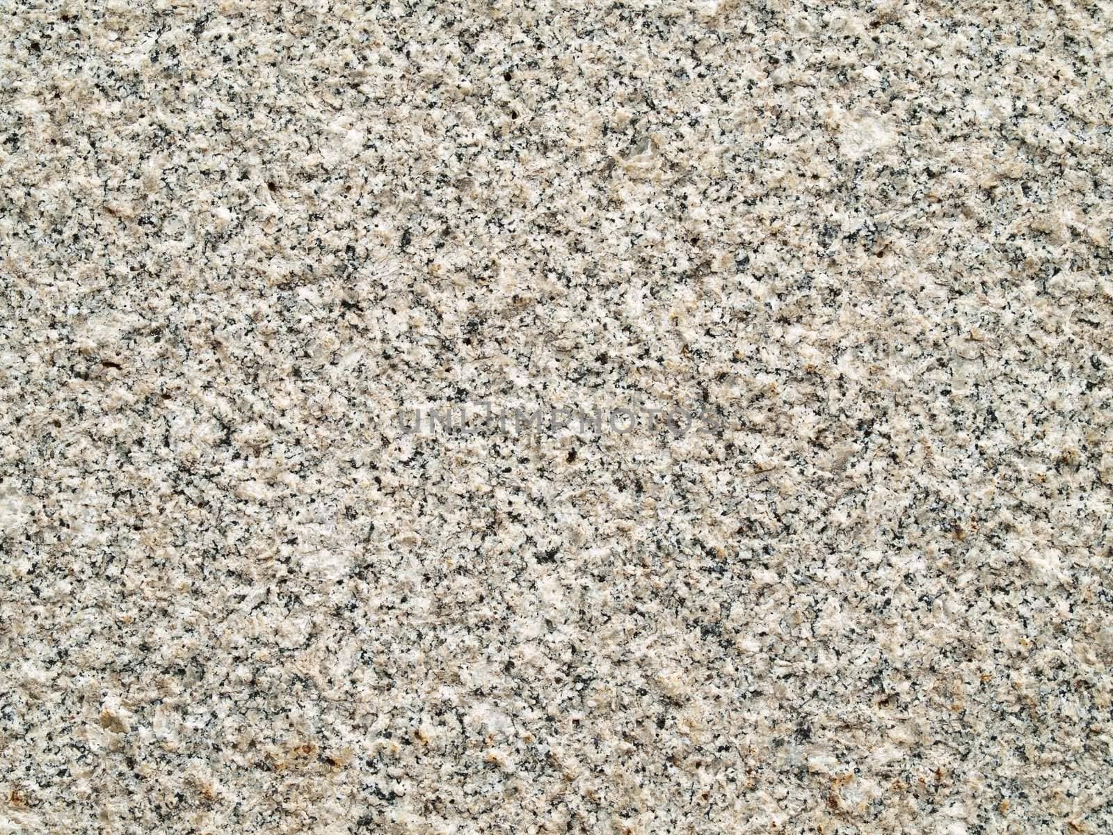 Granite background with crystalline irregular pattern. Gray granite stone.