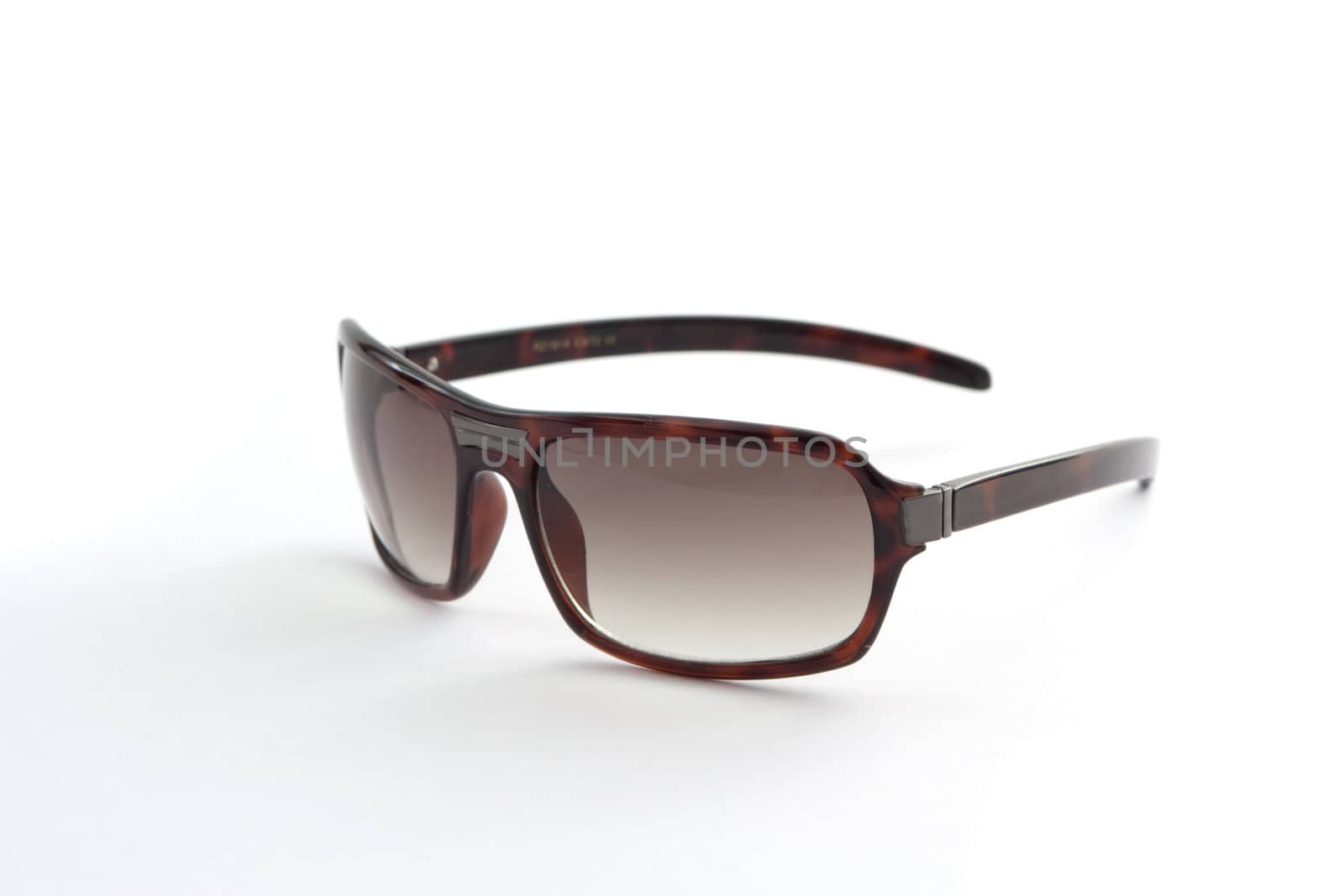 Women's brown sunglasses on a white background
