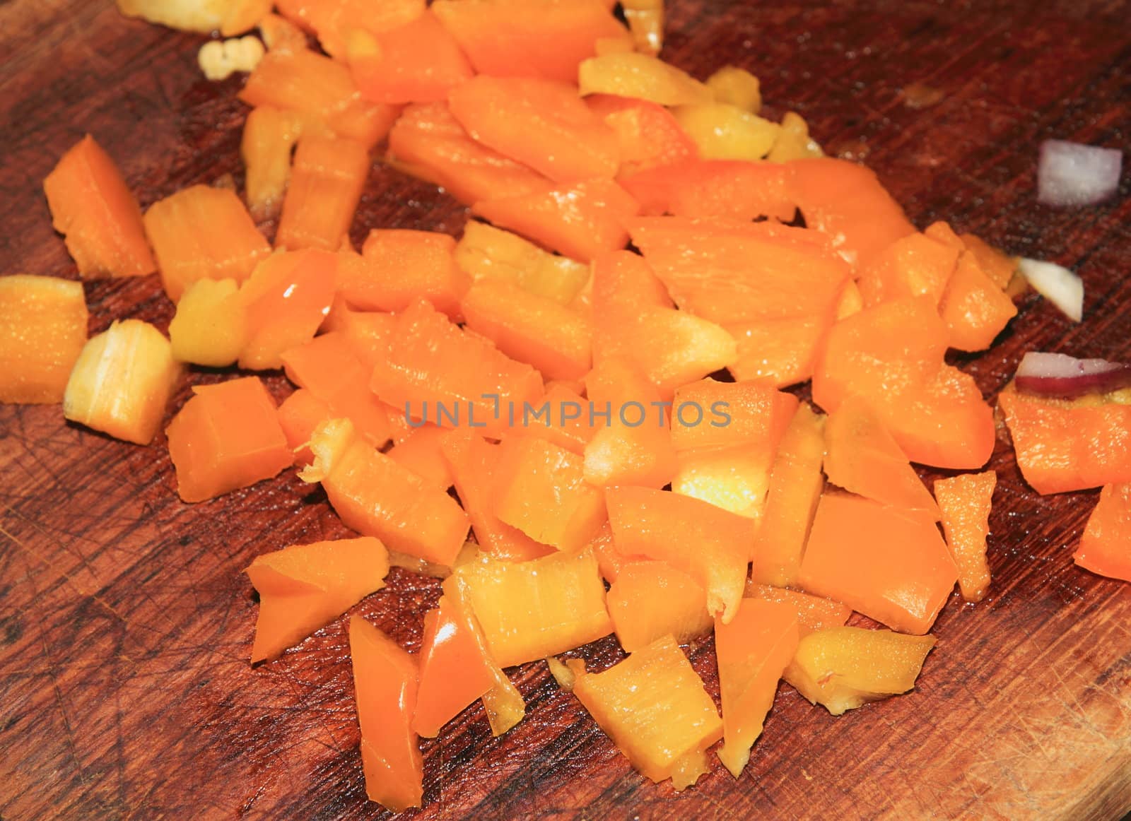 Cut peppers on a wooden surface