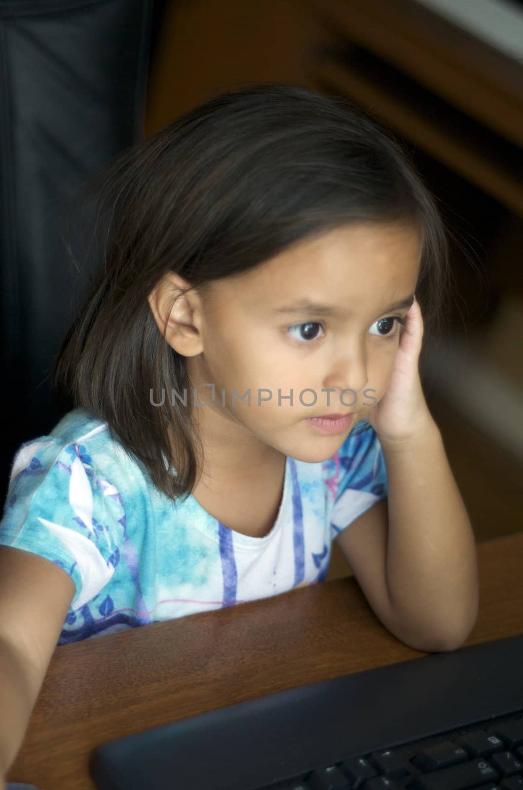 Little girl on computer