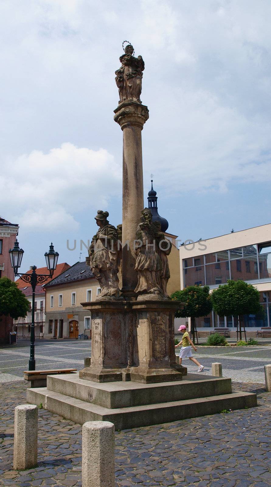Plague Column on the square, this was built in Middle ages, when the pestilence caused death of many people in the town. Czech Republic, Cesky Dub