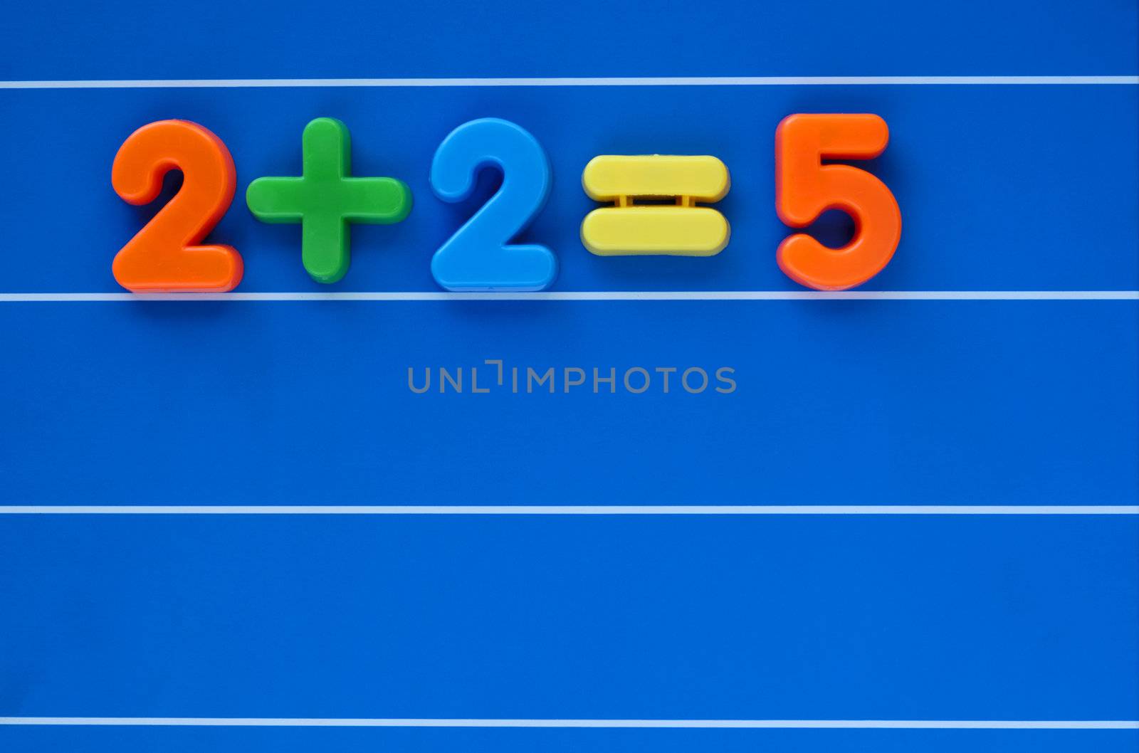 The classic "putting two and two together and getting five", created from a child's toy number set. Sum placed at top left, leaving space for text below.