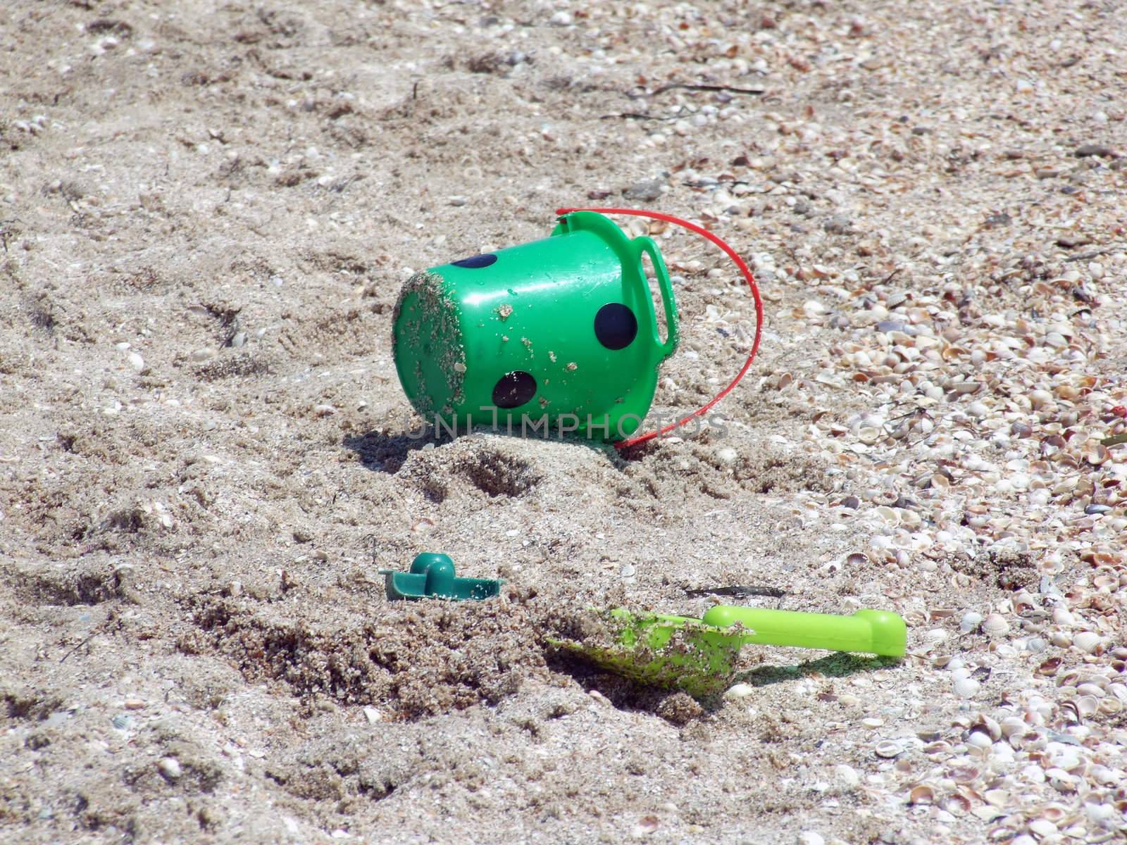 toy bucket and shovel, abandoned at the beach1 by acidgrey